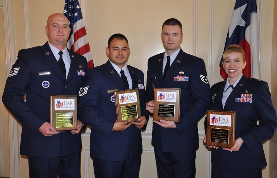 Pictured left to right, Capt. Wendy Moreno, 882nd Training Group, Staff Sgt. Justin Nichols, 82nd Training Group, Tech. Sgt. Gary Haley II, 782nd Training Group, and Tech. Sgt. Brandon Broadway, 982nd Training Group, were recognized by the Wichita Falls Major Francis Grice Chapter Texas Society Daughters of the American Revolution March 26, at an awards luncheon for excellence in technical training in Wichita Falls, Texas. (U.S. Air Force photo/Debi Smith)