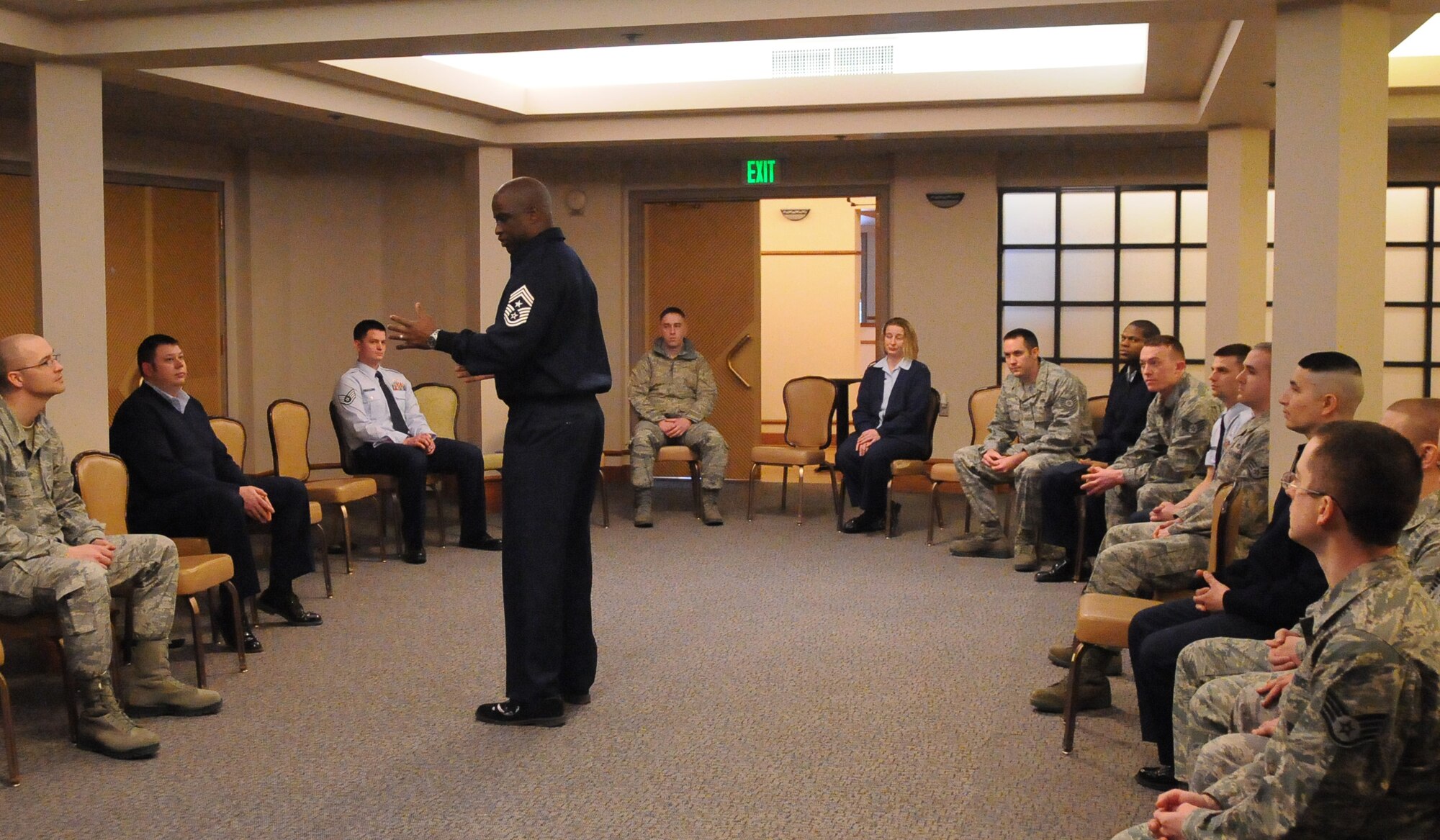 Chief Master Sgt. Jerry Moore speaks to NCOs at an Equal Opportunity seminar March 21, 2011, Eielson Air Force Base, Alaska. The seminar was focused on giving E-5's and E-6's the tools to be better NCOs. Chief Moore is the 354th Fighter Wing command chief. (U.S. Air Force photo/ Airman 1st Class Janine Thibault)
