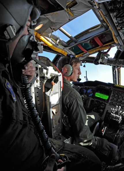 Capt. Nathan Mott, 11th Bomb Squadron pilot, sits behind Congressman John C. Fleming in a B-52H Stratofortress from Barksdale Air Force Base, La., March 25. Captain Mott briefed the congressman about the aircraft's capabilities. (U.S. Air Force photo/Senior Airman Alexandra M. Boutte)(RELEASED)