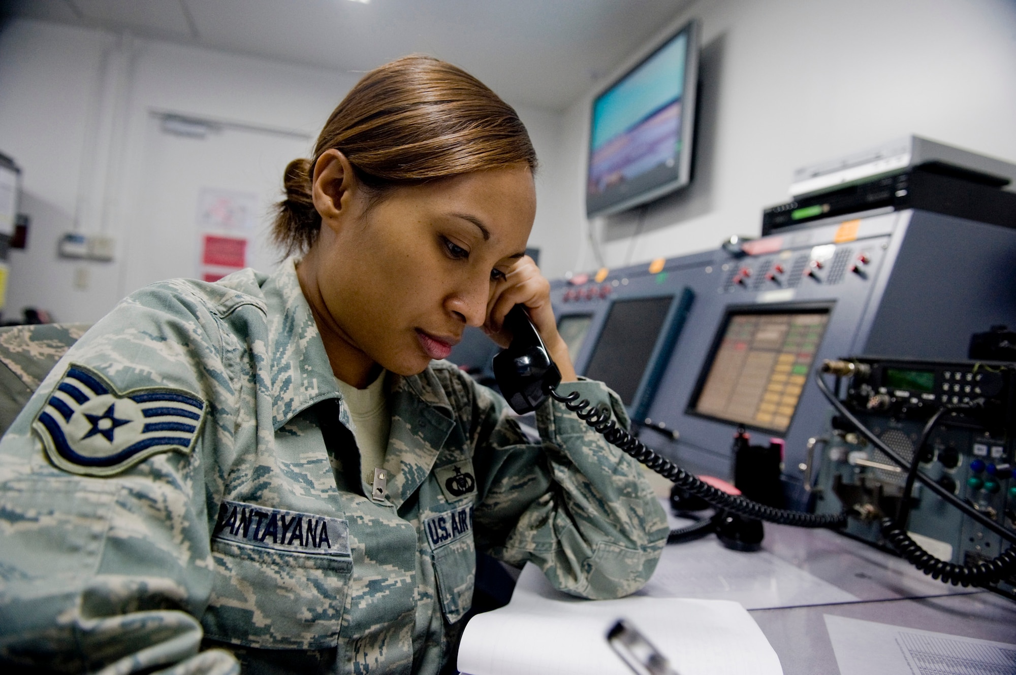 Staff Sgt. Sharron Santayana collects information about incoming aircraft in support of Operation Tomodachi March 28, 2011, at Yokota Air Base, Japan. Santayana is assigned to the 374th Airlift Wing command and control unit. (U.S. Air Force photo/Staff Sgt. Jonathan Steffen)