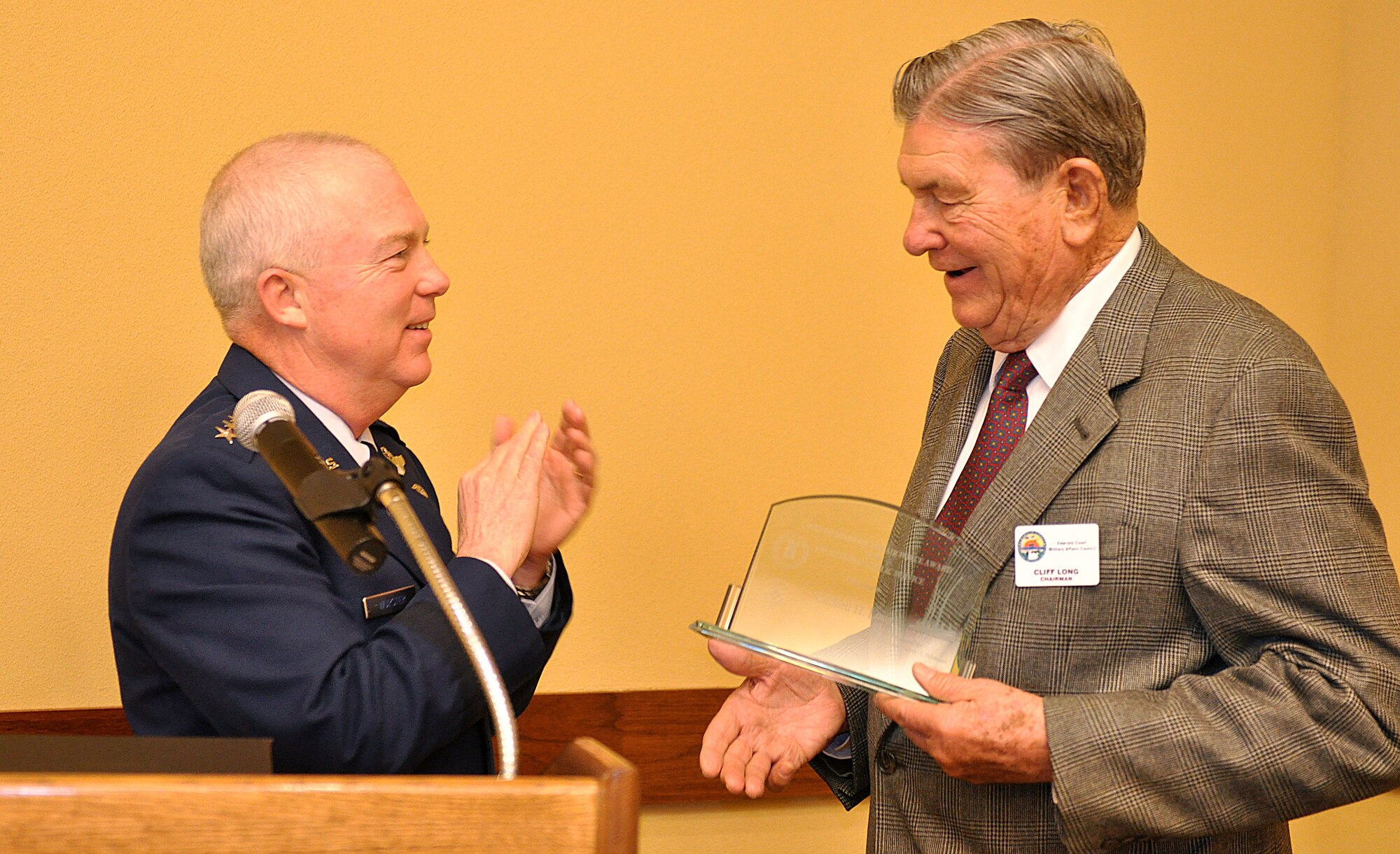 U.S. Air Force Lt. Gen. Donald Wurster, commander of Air Force Special Operations Command, Hurlburt Field, Fla., presents Emerald Coast Military Affairs Council Chairman Cliff Long the Chief of Staff of the Air Force Award for Exceptional Public Service March 23, 2011. 