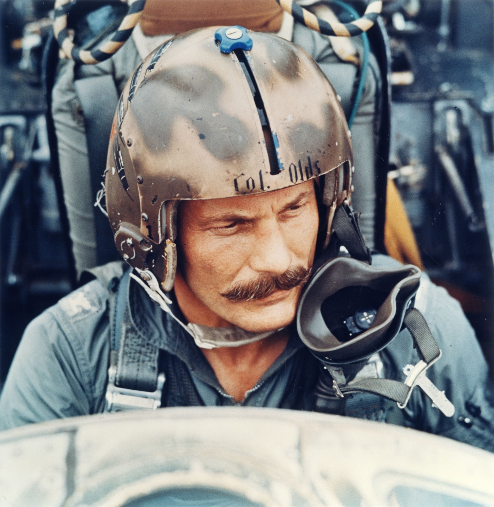 Col. Robin Olds wearing the flight helmet that is on display in the Southeast Asia War Gallery at the National Museum of the U.S. Air Force. (U.S. Air Force photo)