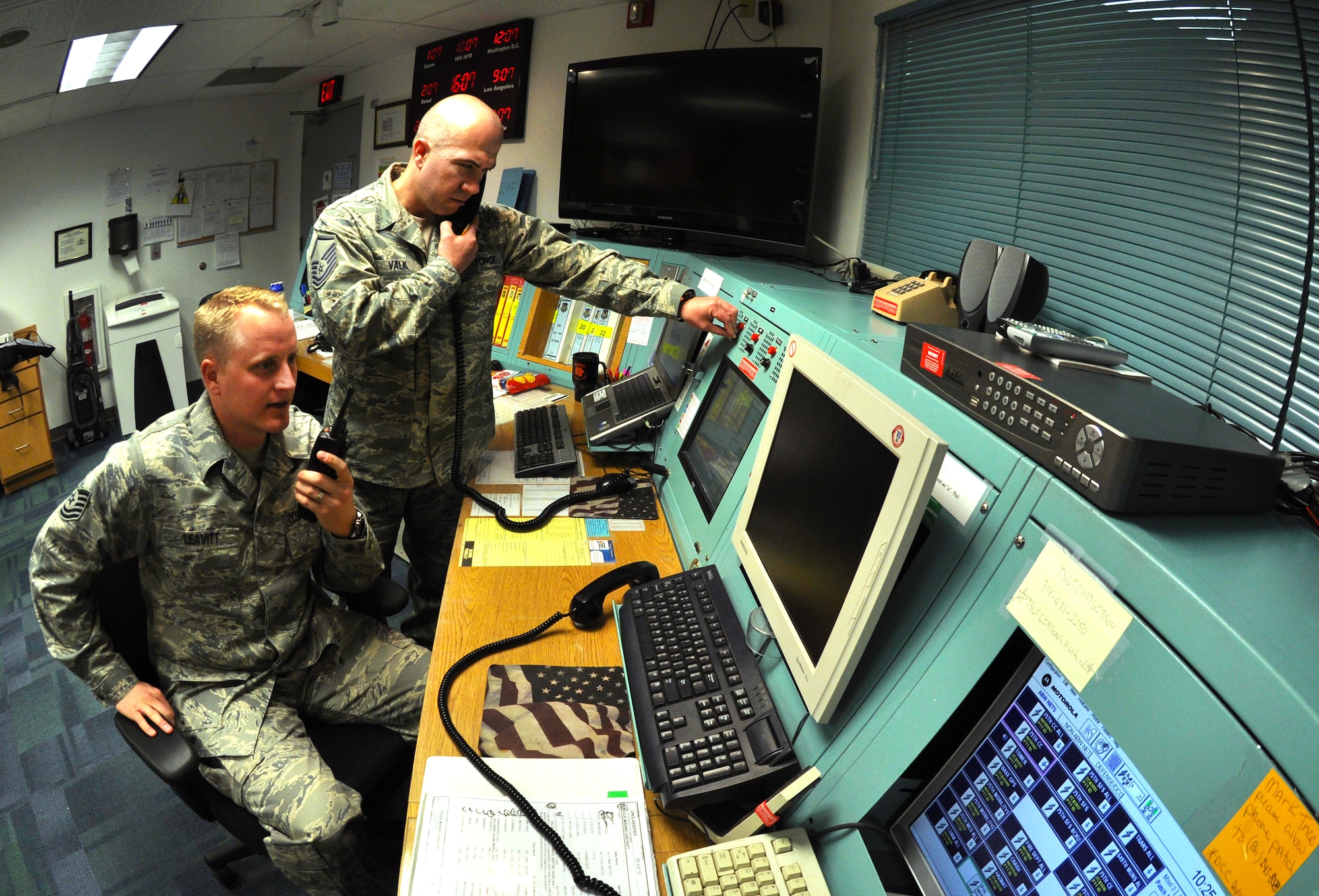 Tech. Sgt. Shane Leavitt, 419th Fighter Wing’s NCOIC of command post operations, works alongside 75th Air Base Wing counterpart Master Sgt. Bruce Valk, command post superintendant. Hill’s consolidated command post has earned accolades for their teamwork, as reserve and active-duty Airmen work side by side to support six commanders on base. (U.S. Air Force photo/Bryan Magaña) 