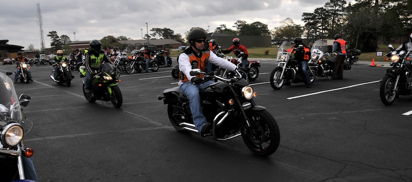 Three hundred Airmen, Sailors, civilians and dependents from Joint Base Charleston begin their ride March 25 from the JB CHS - Air Base theater to the Navy?s outdoor recreation facility, Short Stay, during the 2011 Joint Base Charleston Motorcycle Safety Event. The event provided motorcyclists with information about safe riding, motorcycle laws in South Carolina, military regulations and proper riding equipment. (U.S. Air Force photo/Airman 1st Class Jared Trimarchi)