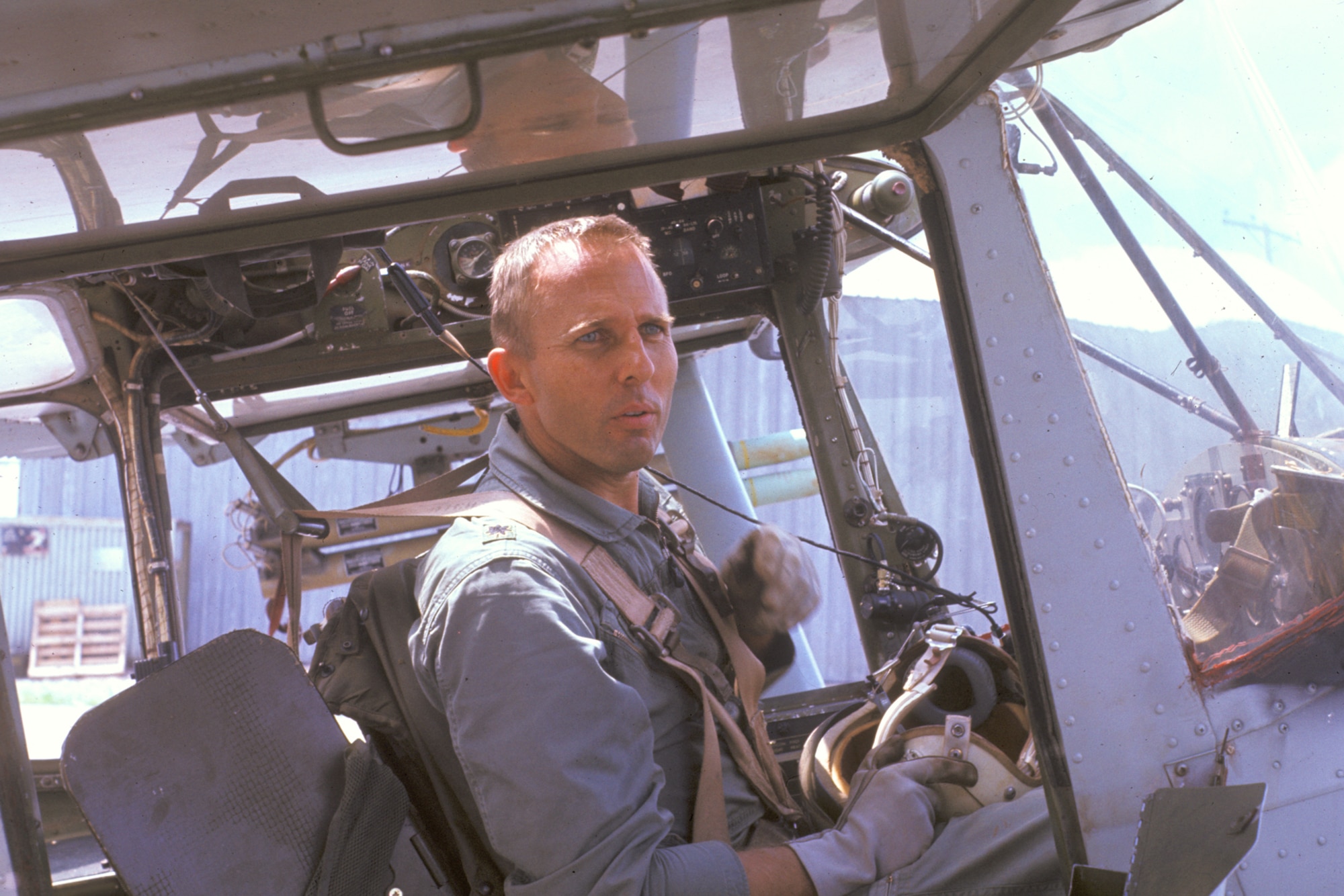 A Forward Air Controller (FAC) prepares for a mission in an O-1 note white phosphorus marking rockets on the wink. U.S. Air Force FACs found and marked targets on the Ho Chi Minh Trail. (U.S. Air Force photo).