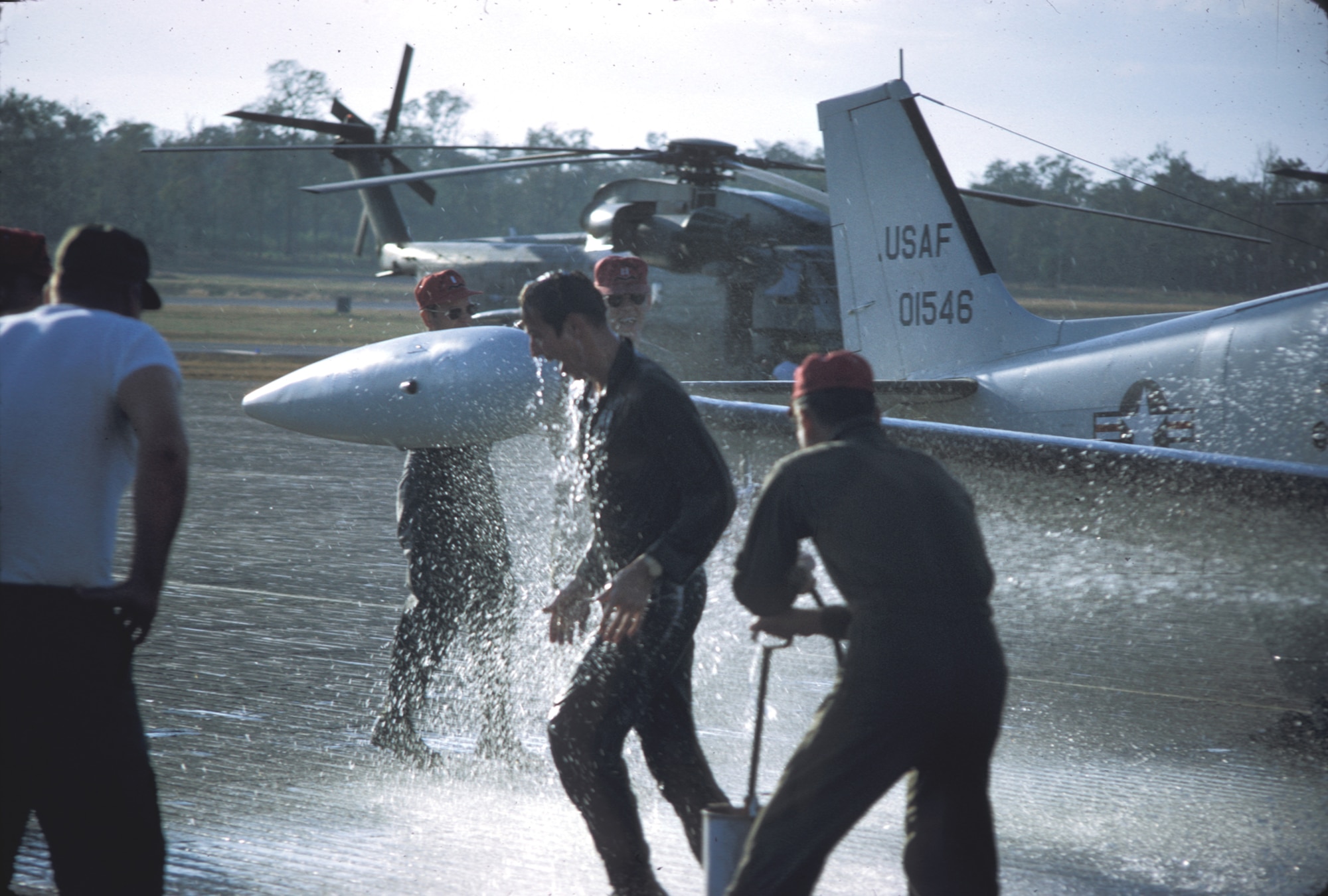 A U.S. Air Force pilot gets a traditional "hose-down" after his last mission over the Trail. (U.S. Air Force photo).