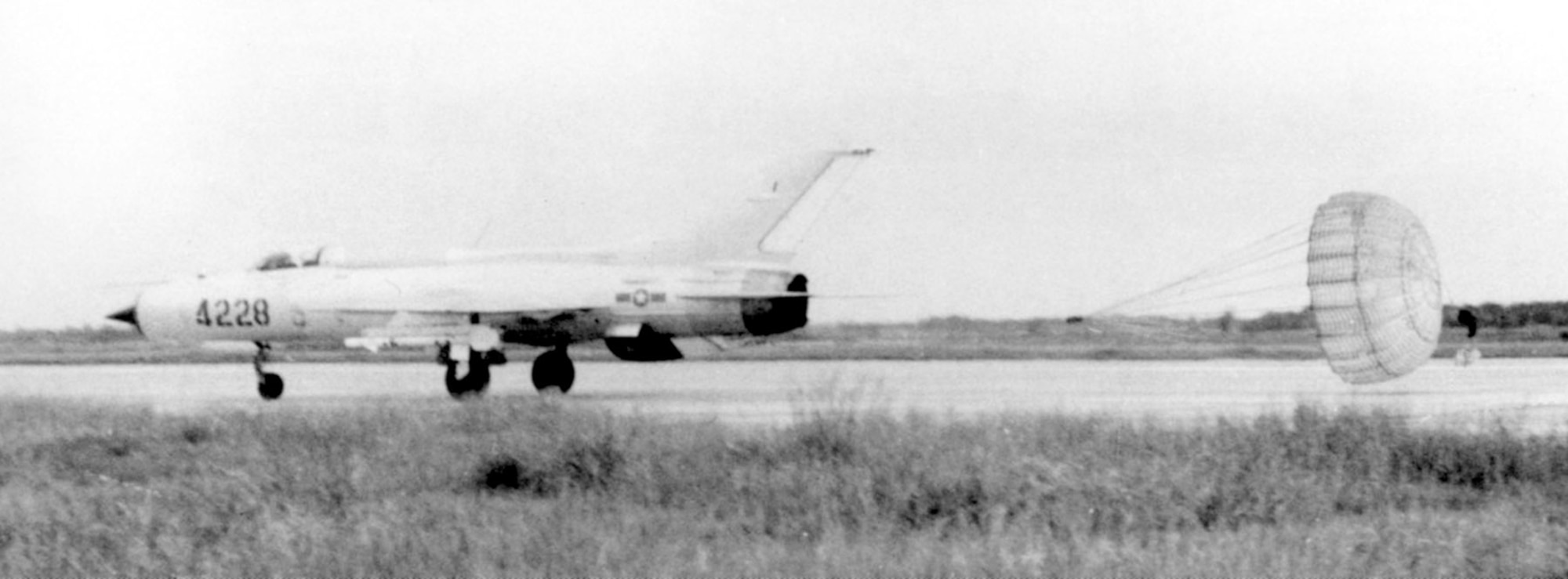 VPAF MiG-21 deploying its braking chute while landing after a mission. (U.S. Air Force photo)