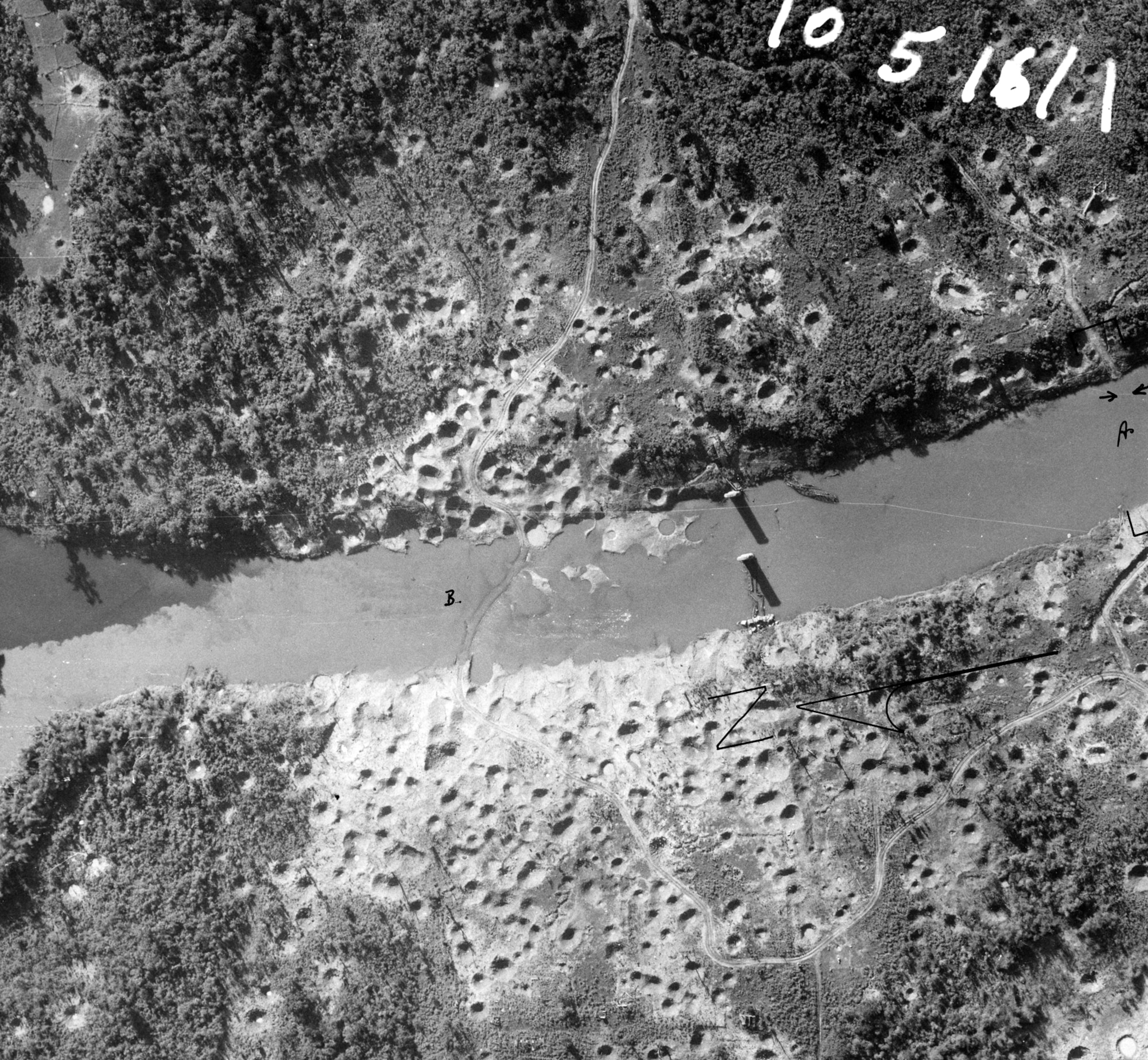 Destroyed bridge and shallow crossing, bombed repeatedly. The U.S. Air Force bombed key points on the Ho Chi Minh Trail. (U.S. Air Force photo).