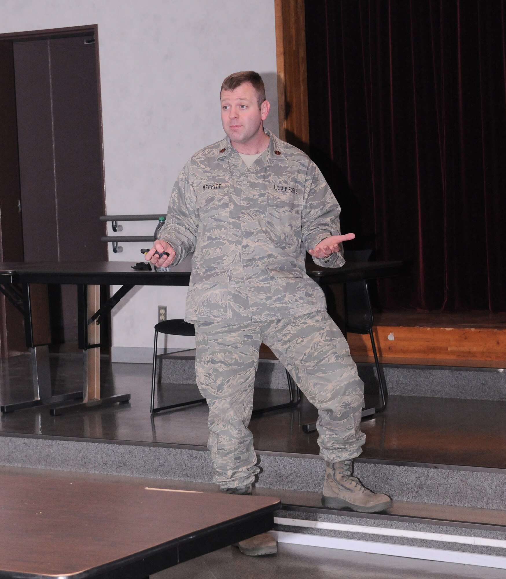 YOKOTA AIR BASE, Japan -- Maj. (Dr.) Mikel Merritt, 374th Medical Operations Squadron clinical psychologist, offers helpful tips for coping with effects of natural disasters at a 'Thriving through Adversity' workshop March 30, 2011. The workshop reflects Yokota's continued commitment to provide for the health of its servicemembers and their families. (U.S. Air Force photo/Airman 1st Class Krystal M. Garrett)