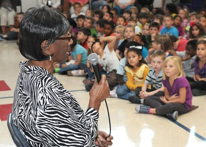 Randolph AFB, TX, 3/31/2011:  Students at Randolph Air Force Base elementary school listen as Lucille Bridges recalls events that led to her daughter Ruby, a first grader,  being among the first  African-American to integrate New Orleans public schools in 1960. Bridges was invited to speak at the base March 31, 2011 as part of Women's History Month activities. (U.S. Air Force photo/David Terry)