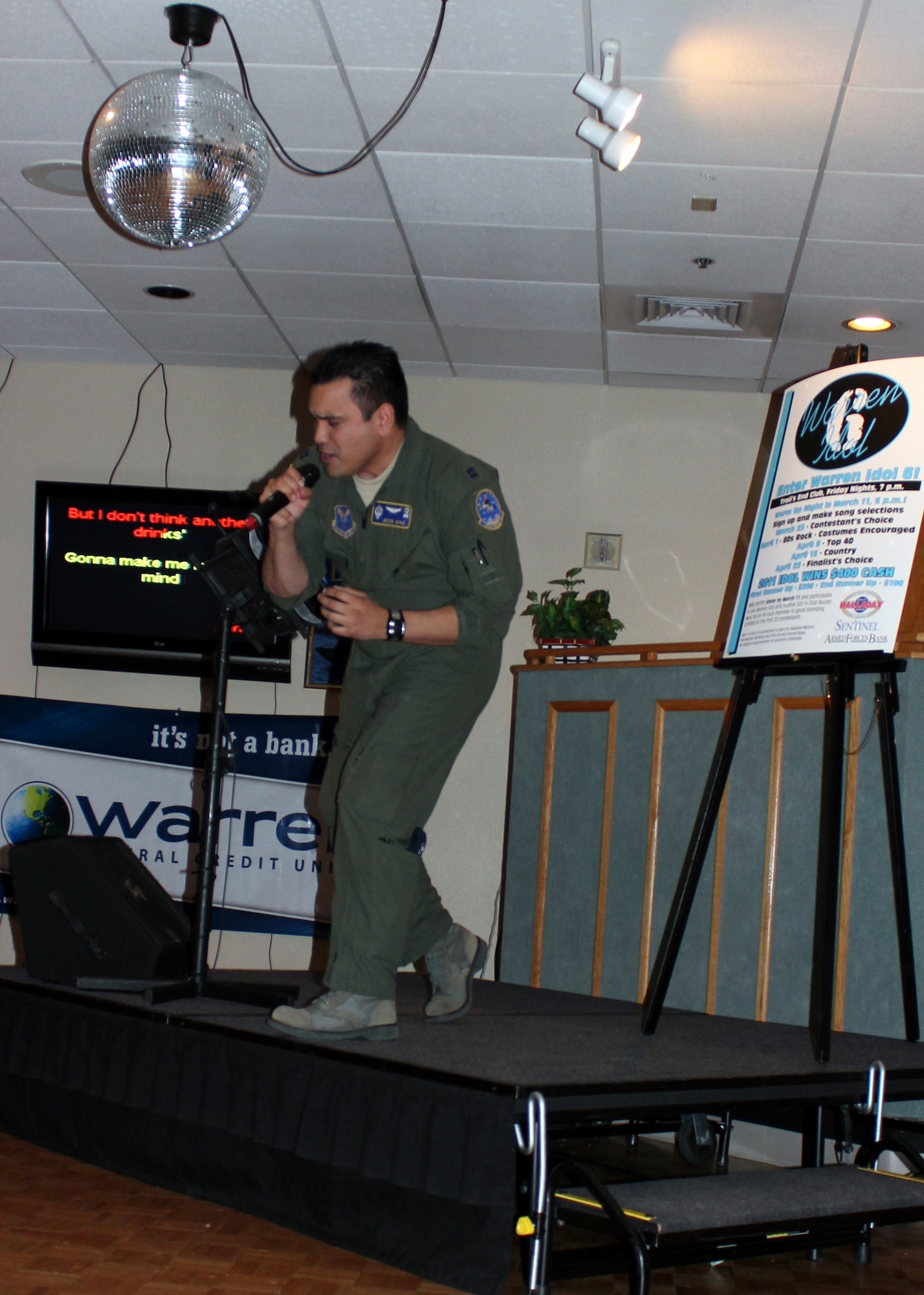 Capt. Jesse Diaz, 320th Missile Squadron, gets into his song selection during the opening night of Warren Idol 6 in the Trail’s End Club March 25. The competition continues today with ‘80s rock, where costumes are encouraged. Warren Idol 6 will see the finalists compete April 22 for a chance to win $400. (Courtesy photo)