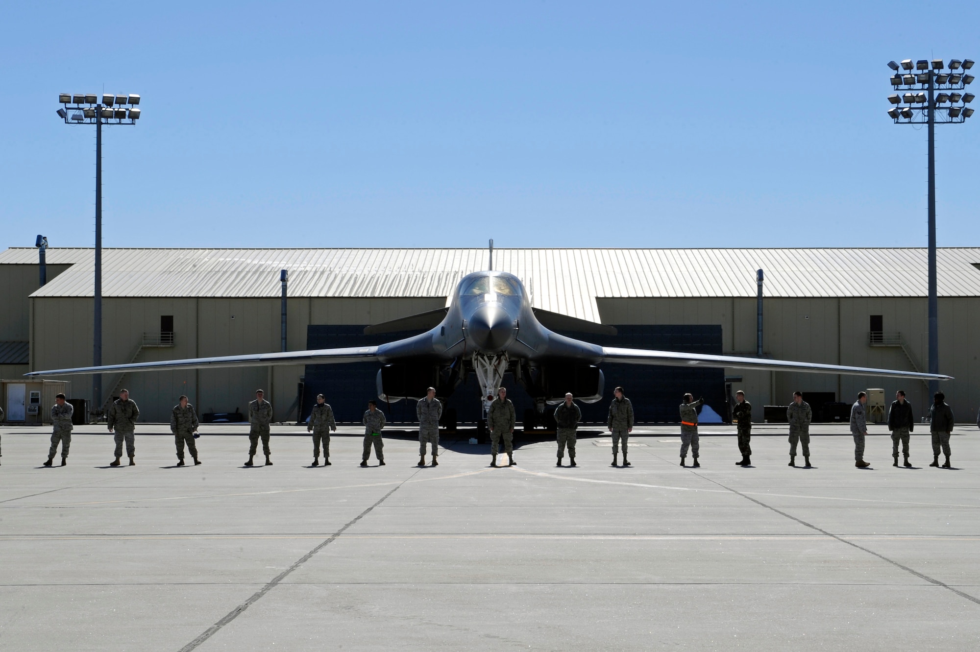 Airmen from the 28th Bomb Wing stand in place to great the return of two B-1B Lancers on Ellsworth Air Force Base, S.D., March 30, 2011.   The B-1s bombed targets in Libya in support of Operation Odyssey Dawn. (U.S. Air Force photo/Staff Sgt. Marc I. Lane)