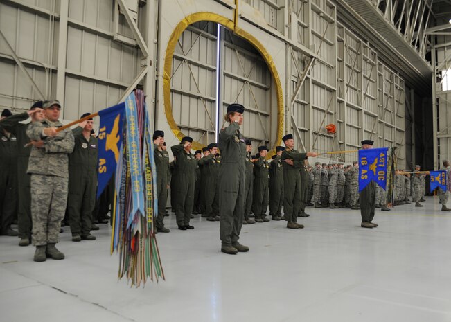 Members of the Operations Group salute during the 437th Airlift Wing change of command ceremony on Joint Base Charleston, S.C. March 29. (U.S. Air Force photo/Staff Sgt. Katie Gieratz)