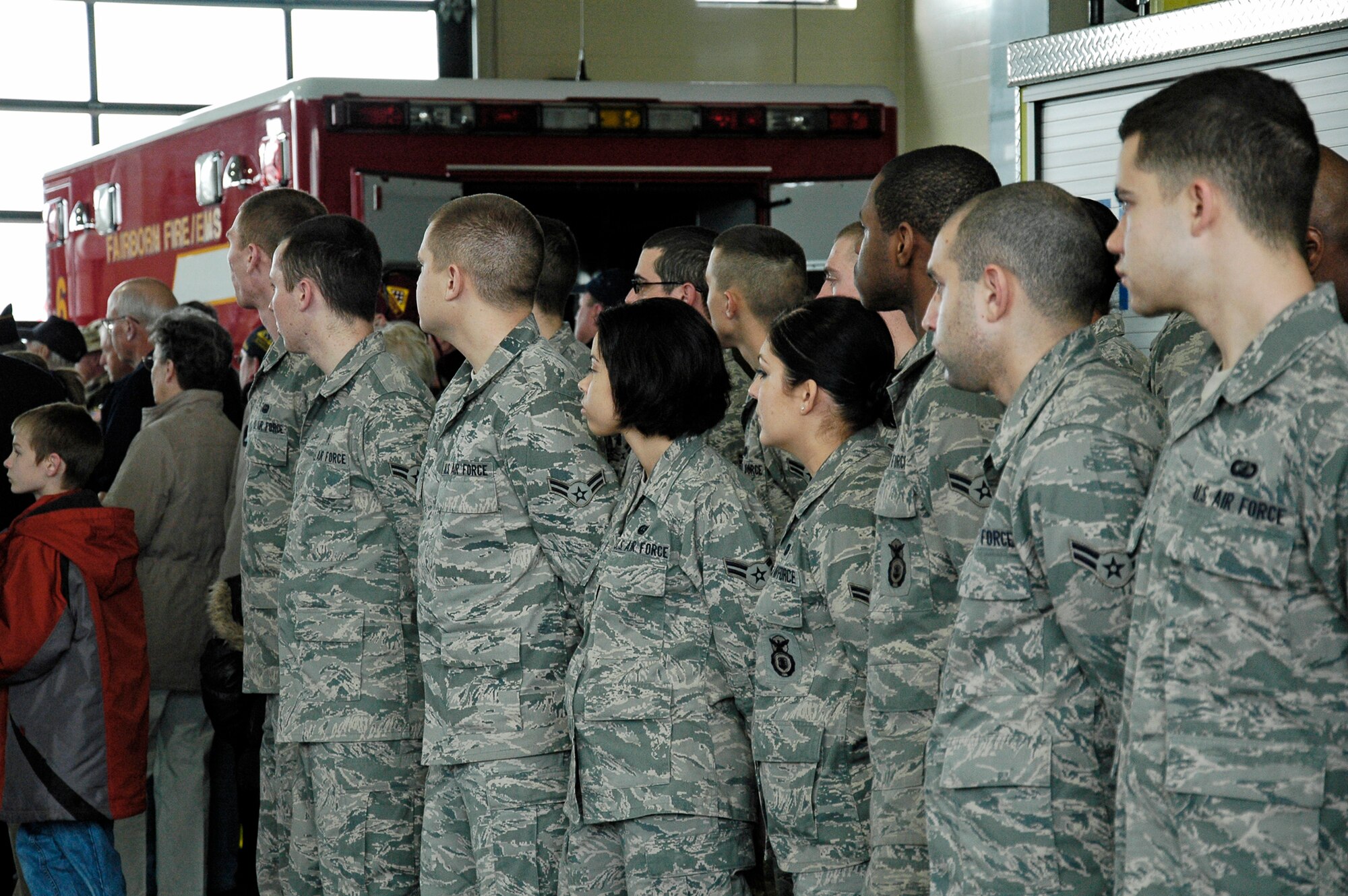 Airmen from Wright-Patterson AIr Force Base's Airman Leadership School listen during a ceremony March 25, 2011 in Fairborn, Ohio marking the arrival of a large steel beam from New York's World Trade Center.  The artifact will become part of a permanent memorial to honor first responders and victims of the 9/11 terrorists attacks.  It will be located at the National Center for Medical Readiness, located in Fairborn near Wright-Patterson Air Force Base. (Skywrighter photo/Niki Jahns)