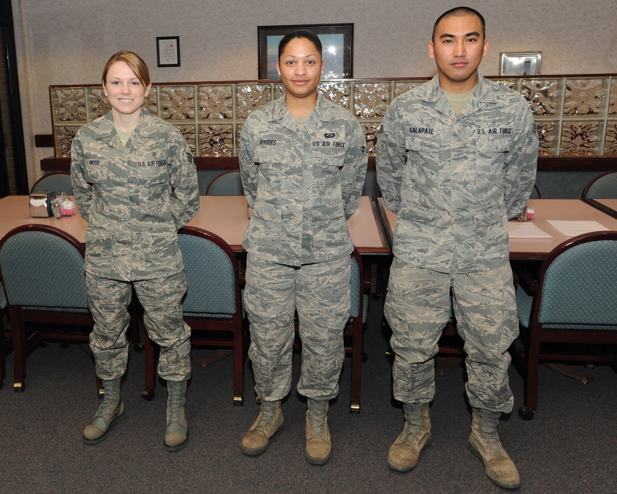 March’s Diamond Sharp Award recipients are (from left to right) Senior Airman Shay Wood, 319th Medical Operations Squadron; Airman 1st Class Teresa Rhodes, 319th Comptroller Squadron; and Senior Airman Michael Galapate, 319th Communications Squadron. (U.S. Air Force photo by Staff Sgt. Suellyn Nuckolls)