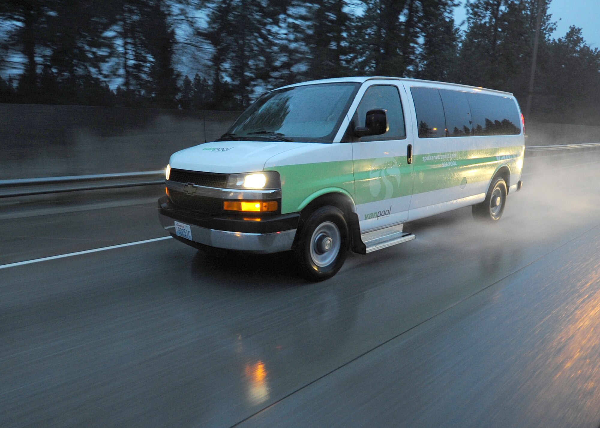 Five members of Fairchild Air Force Base travel west on I-90 in their van pool March 28, 2011. The group meets at the Five Mile Park and Ride Lot in North Spokane at the intersection of Ash Street and Five Mile Road and leave at 6:15 a.m. for their commute to Fairchild. There are a dozen park and ride lots in Spokane County. Some van pools have openings and there’s always opportunities to start a new van pool. (U.S. Air Force photo/Senior Airman Michael Means)