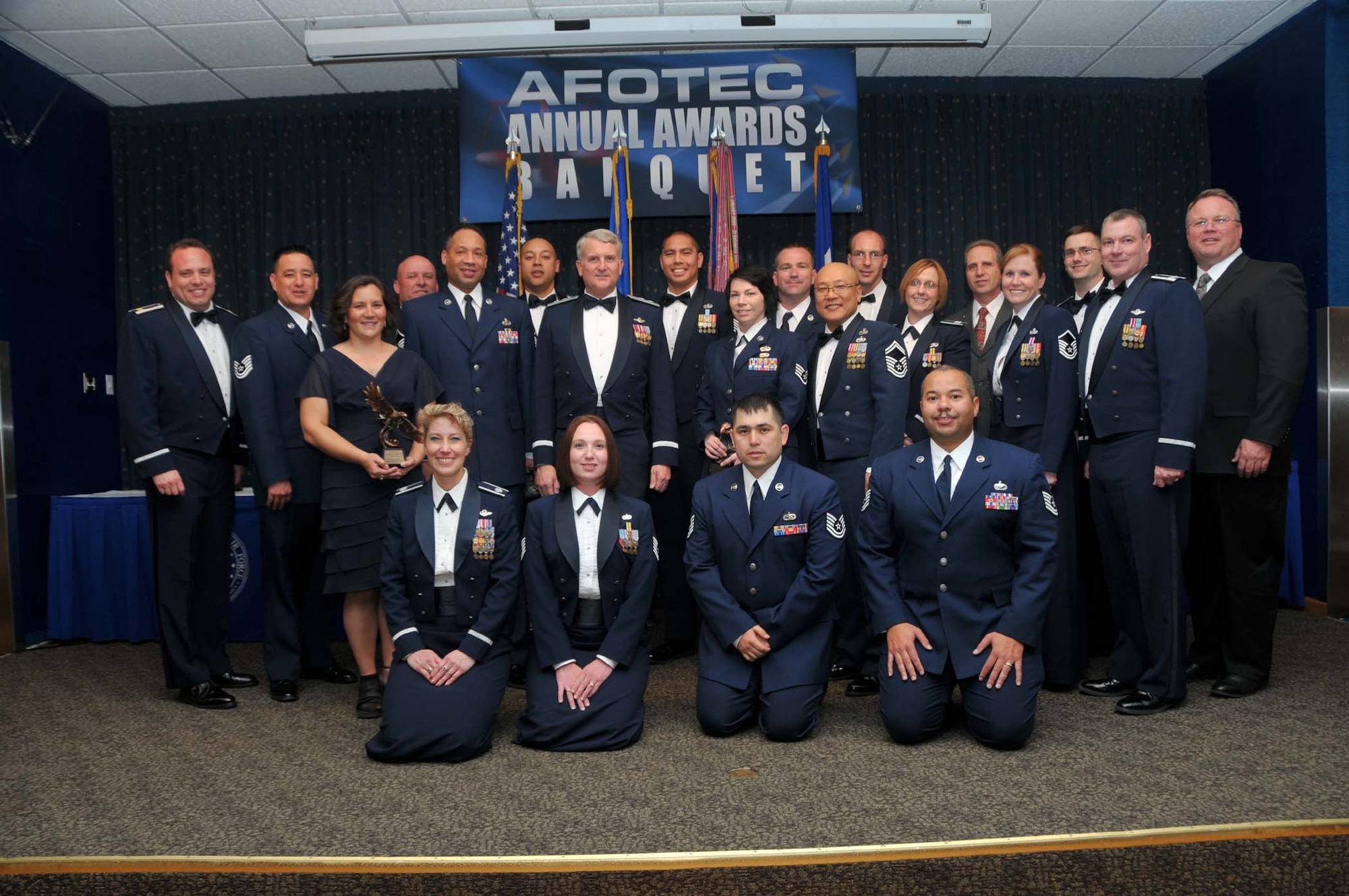 Air Force Operational Test and Evaluation Center Commander Maj. Gen. David J. Eichhorn (center row, third from left) joins outstanding AFOTEC performers from 2010 that were honored during the March 24 AFOTEC Annual Awards Banquet.

