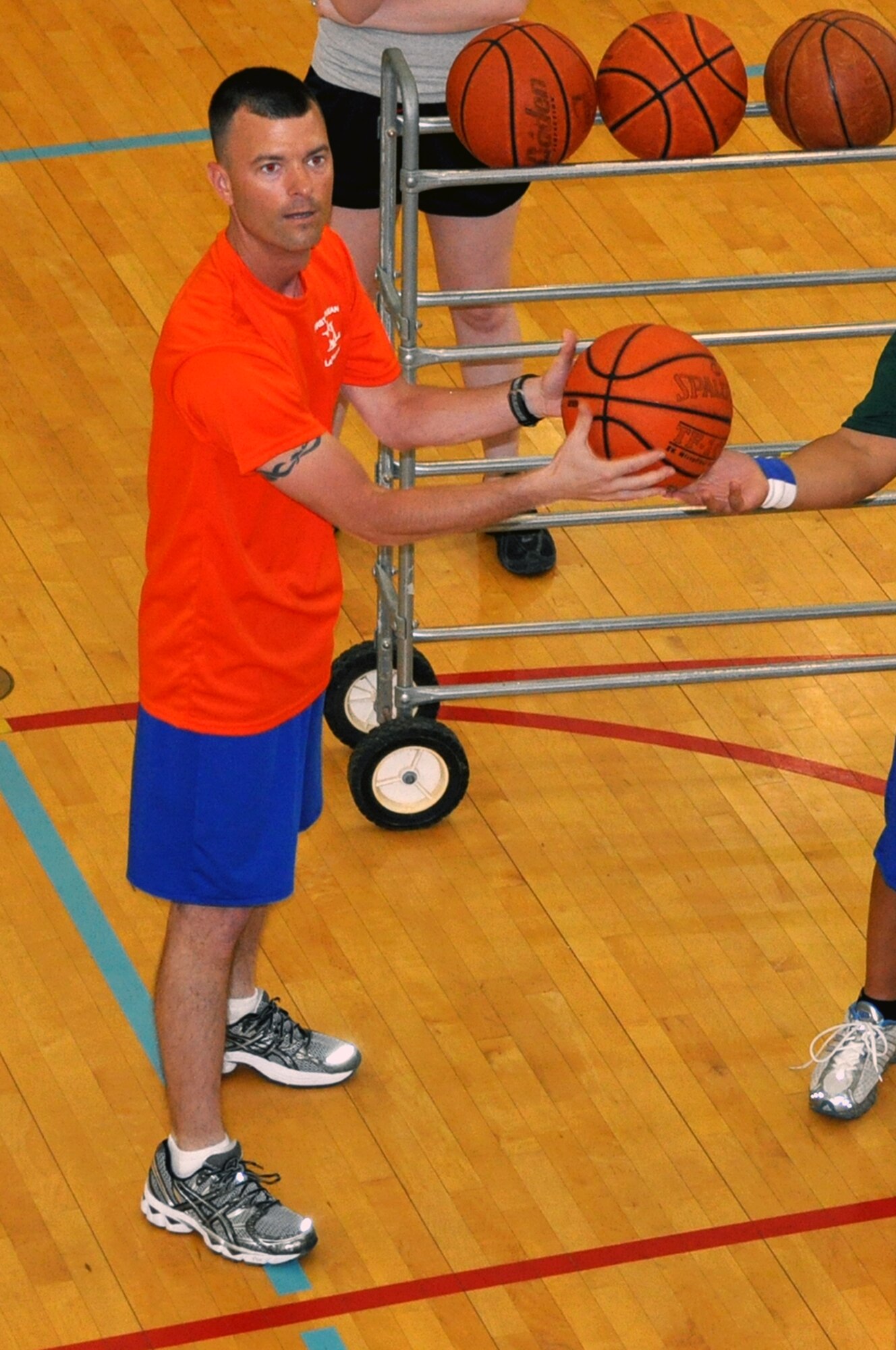 LAUGHLIN AIR FORCE BASE, Texas - - Master Sgt. Nick Kurpier, 47th Medical Group first sergeant, prepares for a free throw attempt during First Sergeants versus Chiefs basketball shoot-out at Laughlin’s Losano Fitness Center, March 29. The competition allowed each shooter two minutes to make as many shots as possible, which ended in an 84 to 69 victory for the first sergeants. (U.S. Air Force photo by Senior Airman Scott Saldukas)