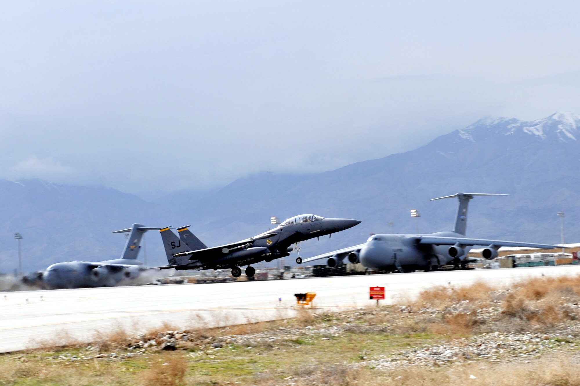 Maj. Tracy Schmidt, 389th Expeditionary Fighter Squadron F-15E Strike Eagle pilot, and Capt. Kimberly Volk, weapons system officer, takes off at Bagram Airfield, Afghanistan, March 29, 2011. (U.S. Air Force photo by Senior Airman Sheila deVera)