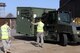 An Airman from the 100th Logistics Readiness Squadron cargo deployment function marshals a forklift operator here March 23, 2011. The pallet on the forklift will be sent via airlift to support Joint Task Force Odyssey Dawn.  JTF Odyssey Dawn is the U.S. Africa Command task force established to provide operational and tactical command and control of U.S. military forces supporting the international response to the unrest in Libya and enforcement of United Nations Security Council Resolution (UNSCR) 1973. UNSCR 1973 authorizes 