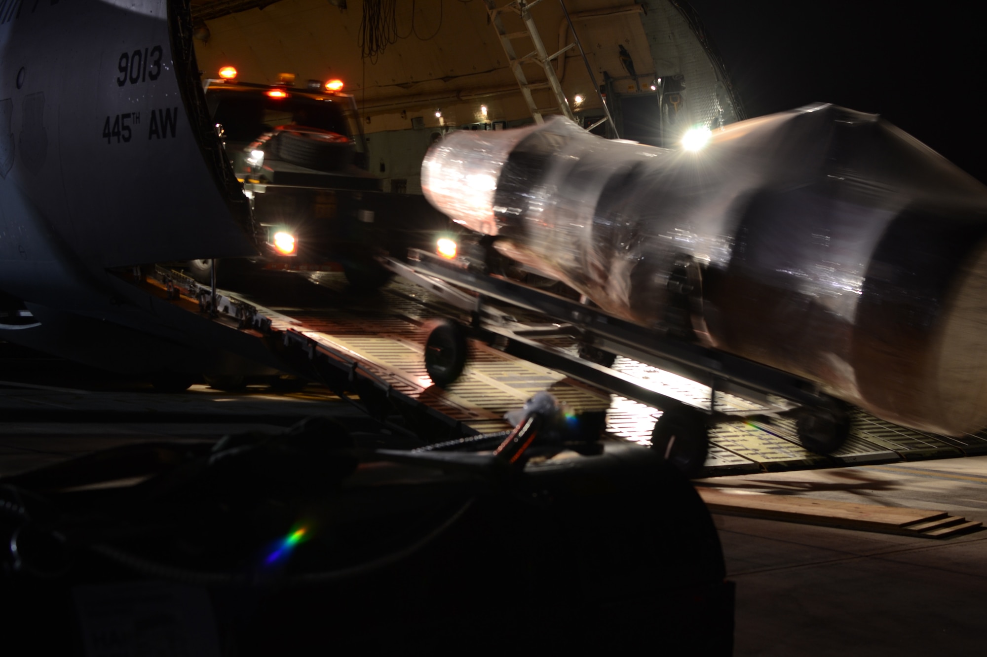 WRIGHT-PATTERSON AIR FORCE BASE, Ohio – A 445th Airlift Wing C-5 Galaxy flown by the 89th Airlift Squadron delivered support equipment belonging to the 552nd Air Control Wing from Tinker Air Force Base, Okla., to Rota Naval Air Station, Spain, in support of Operation Odyssey Dawn March 22. The 445th’s C-5 was one of four C-5s tasked to transport the equipment and ground crew from Oklahoma to Spain. (U.S. Air Force photo/Senior Master Sgt. Michael Kalbfleisch)