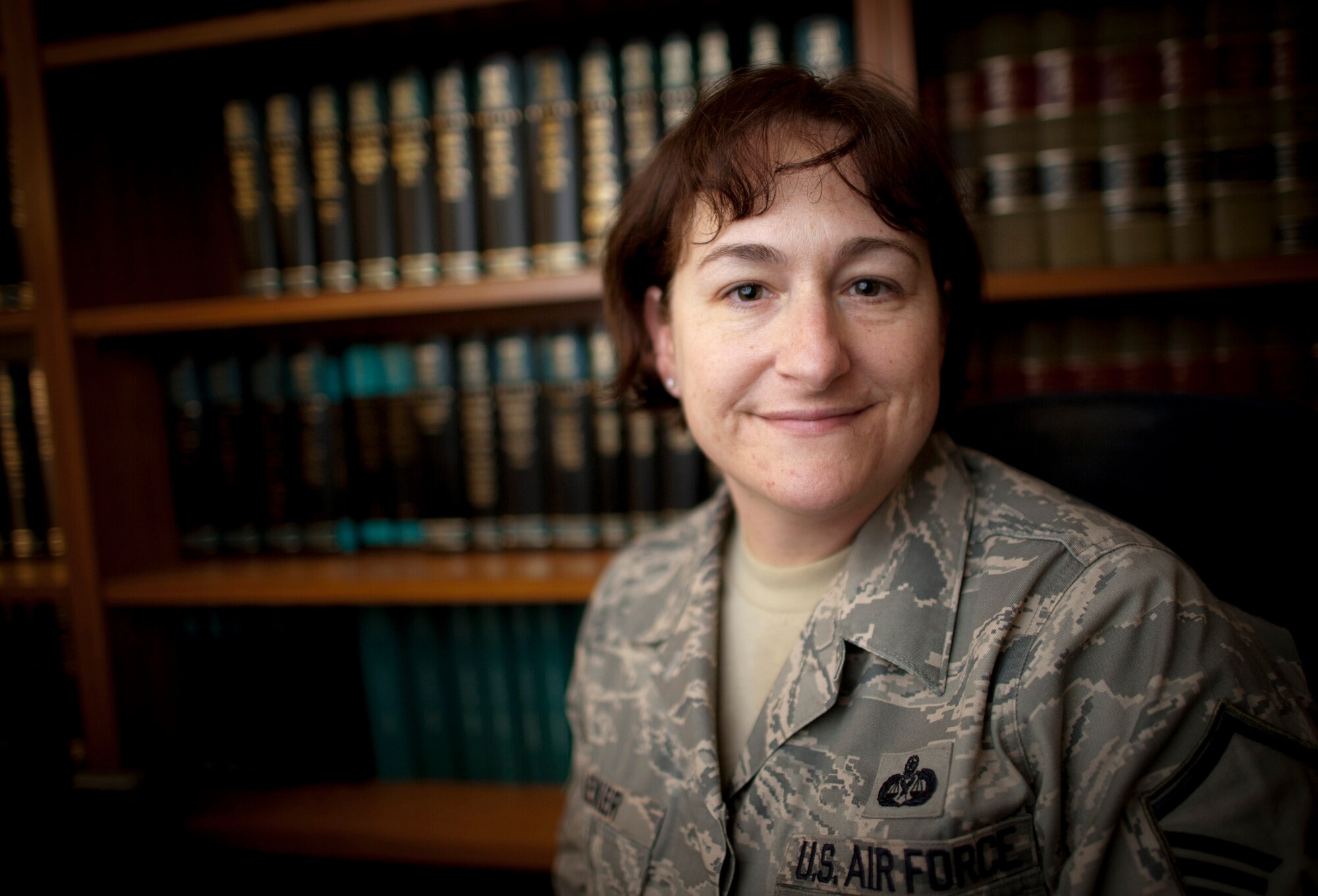 YOKOTA AIR BASE, Japan -- Master Sgt. Shanti Leiker, 374th Airlift Wing staff agencies first sergeant, poses for a photo in the judge advocate office library at Yokota Air Base, Japan, March 31, 2011. Through both her volunteer work and the support she gives her Airmen in wing staff agencies, MSgt Leiker plays a vital part here at Yokota and in Operation Tomodachi. (U.S. Air Force photo/Staff Sgt. Samuel Morse)