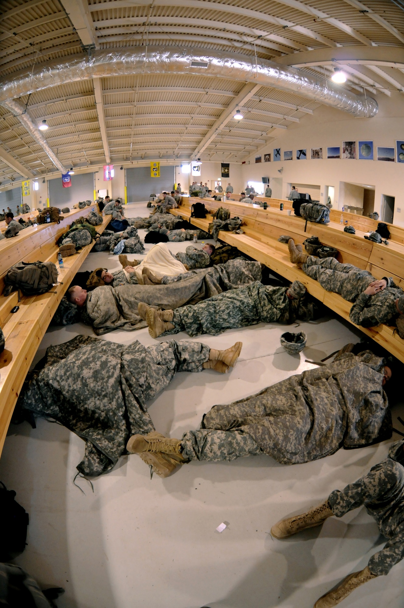 Members of the U.S. Army 173rd Airborne Brigade Combat Team rest after jumping from a C-17 Globemaster III during a joint coalition training exercise March 23. More than 1,400 personnel from the 173rd Airborne Brigade Combat Team, the 8th ASOS and Italian army paratroopers participated in the weeklong event. ( U.S. Air Force photo/ Airman Briana N. Jones)