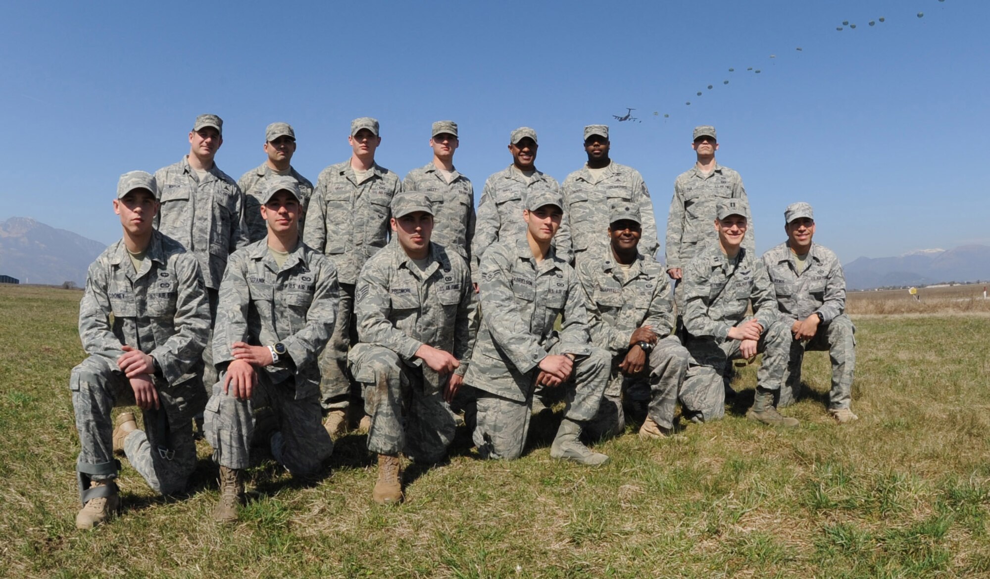 Airmen from the 8th Air Support Operations Squadron pose after conducting a combat equipment jump during a joint coalition training exercise March 23. More than 1,400 personnel from the U.S. Army 173rd Airborne Brigade Combat team, the 8th ASOS and Italian Army Paratroopers participated in the weeklong event. (U.S. Air Force photo/ Staff Sgt. Nadine Y. Barclay)