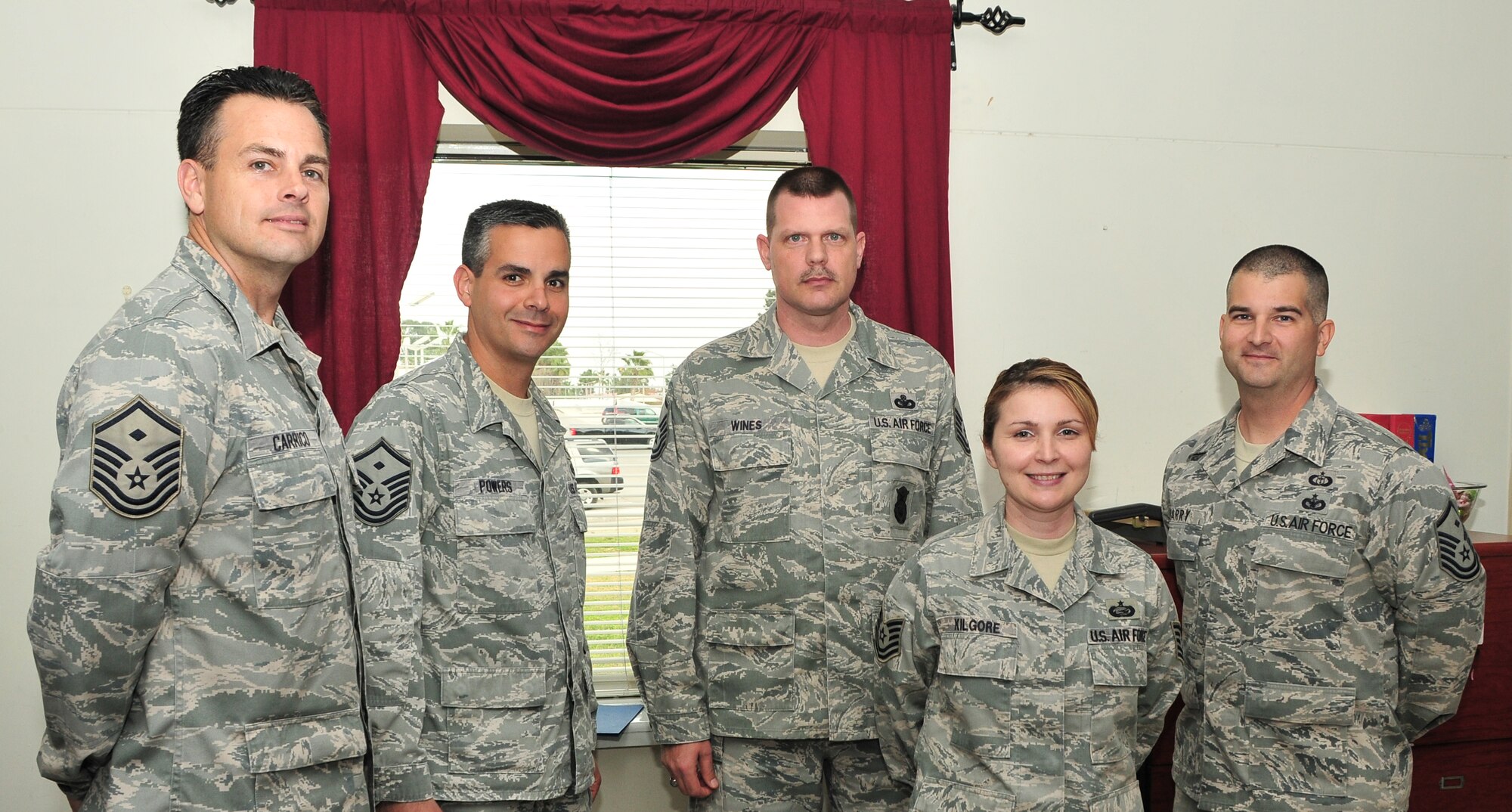 Members of the Incirlik First Sergeants Council pose with the March “Diamond Sharp” award winner, Tech. Sgt. Misty Kilgore, from the 39th Force Support Squadron, March 28, 2011, at Incirlik Air Base, Turkey. From left to right: Master Sgts. Christopher Carrico, Aaron Powers, and Craig Wines, Sergeant Kilgore and Master Sgt. Bill Barry. The “Diamond Sharp” award recognizes Airmen who have distinguished themselves through outstanding professionalism, performance and display of the Air Force core values. (U.S. Air Force photo by Staff Sgt. Alexandre Montes/Released)