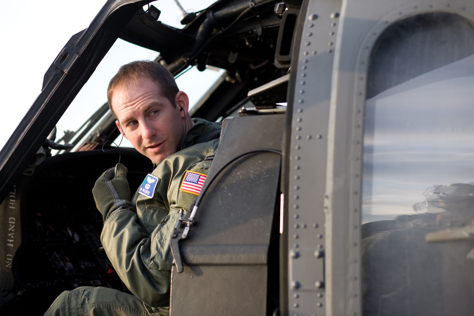 YOKOTA AIR BASE, Japan -- Captain Kevin Weaver, 33rd Rescue Squadron, prepares for a flight bound for Fukushima prefecture March 28, 2011 at Yokota Air Base. The U.S. military is fully committed to supporting the disaster response efforts of the Government of Japan and the Japan Self-Defense Force. (U.S. Air Force photo/Osakabe Yasuo) 