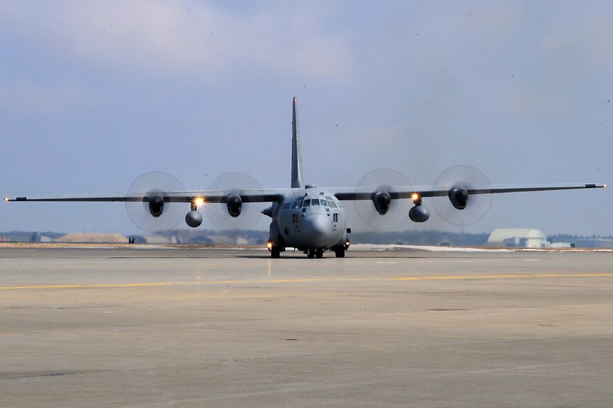MISAWA AIR BASE, Japan -- A C-130 Hercules carrying supplies in support of Operation Tomodachi taxis to a parking spot March 31. Supplies and rescue workers have been arriving on a regular basis since March 13 after an earthquake shook Japan. (U.S. Air Force photo by Staff Sgt. Marie Brown\Released)