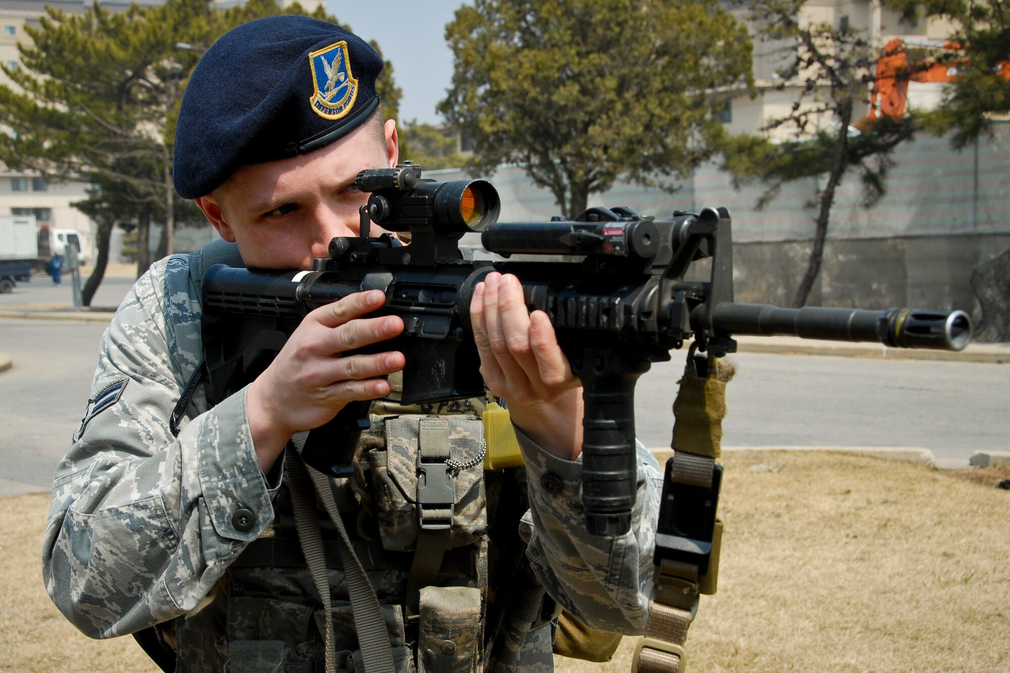 KUNSAN AIR BASE, Republic of Korea -- Airman 1st Class Adam Mathias, 8th Security Forces Squadron pass and registration clerk and first-term Airman, practices proper security procedures here March 31 as he prepares for the upcoming Operational Readiness Inspection slated for the week of April 4. (U.S. Air Force photo/Senior Airman Benjamin Stratton)
