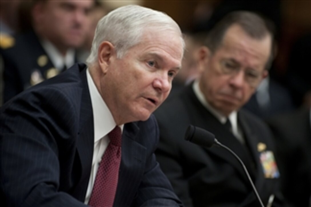 Secretary of Defense Robert M. Gates and Chairman of the Joint Chiefs of Staff Adm. Mike Mullen testify at a hearing of the House Armed Services Committee on operations in Libya in the Rayburn House Office Building in Washington, D.C., on March 31, 2011.  