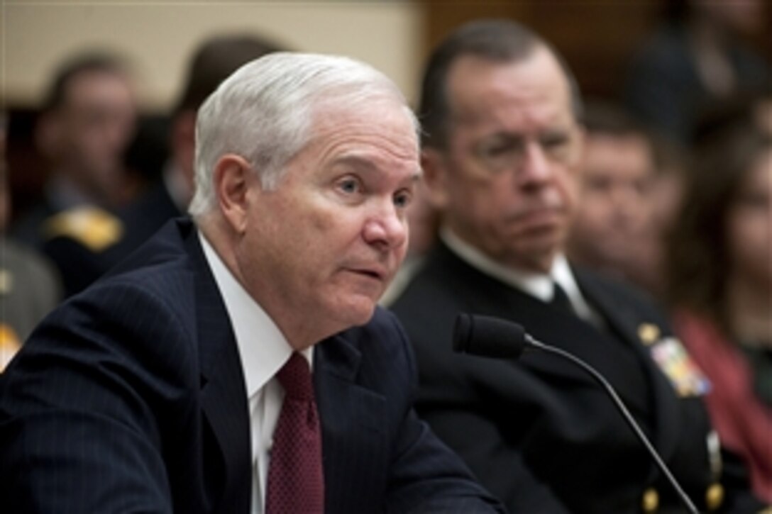 Defense Secretary Robert M. Gates, left, and Navy Adm. Mike Mullen, right, chairman of the Joint Chiefs of Staff, testify at a hearing of the House Armed Services Committee on operations in Libya at the Rayburn House Office Building in Washington, D.C., March 31, 2011.