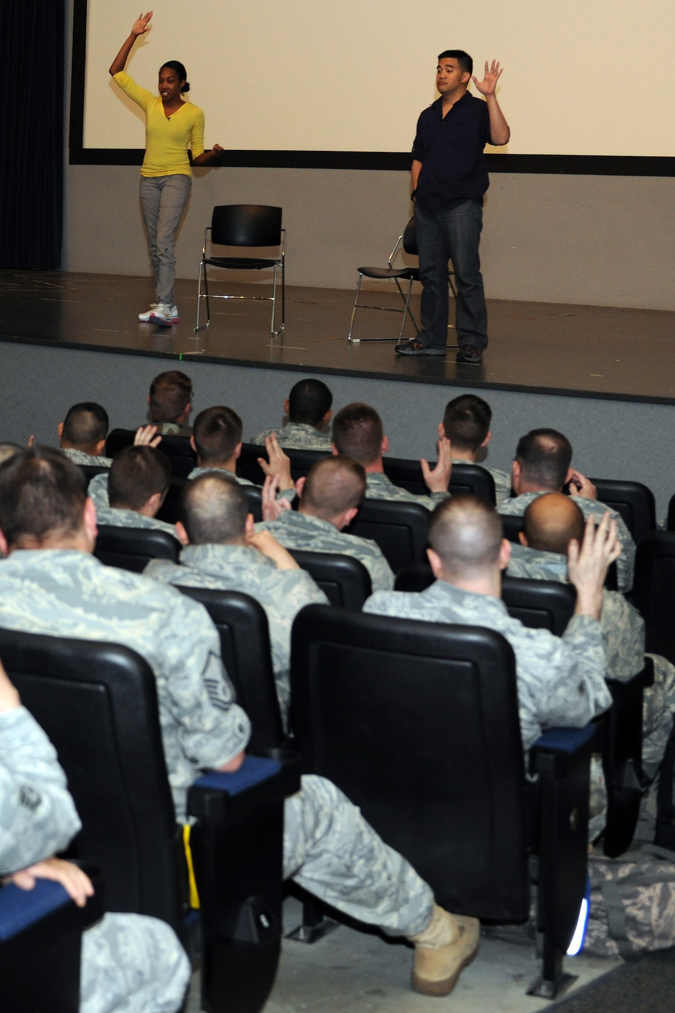 KUNSAN AIR BASE, Republic of Korea -- Sharyon Culberson and Eric Sumangil, both from Catharsis Productions, performs the improvisational show, ‘Sex Signals’, for Airmen at the base theater here April 29. The presentation differs from traditional sexual assault prevention programs in that it incorporates improvisational comedy, education and audience interaction to provide a provocative look at dating, sex and the core issue of consent. (U.S. Air Force photo/Senior Airman Brittany Y. Bateman)