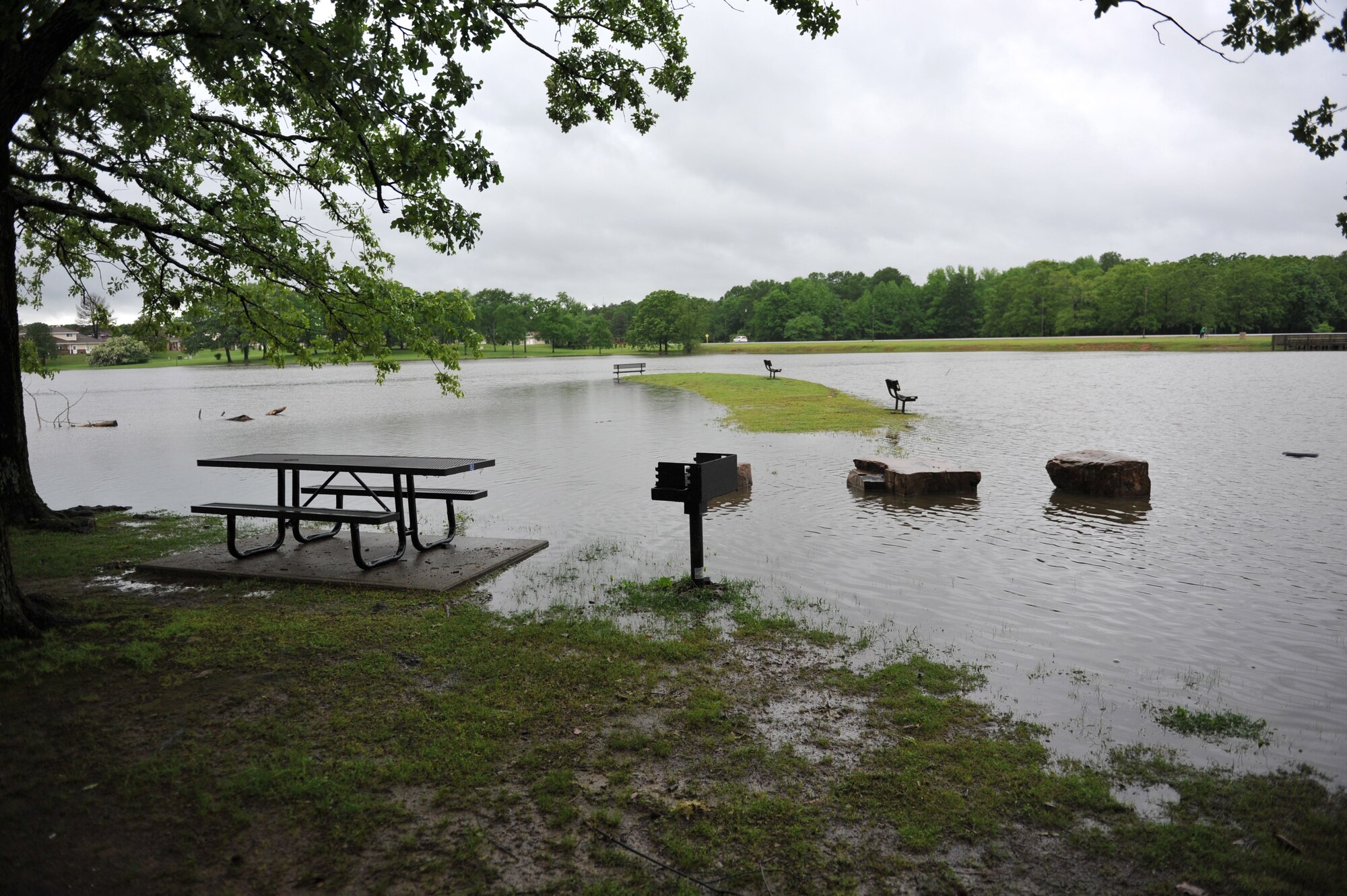 The base lake at Little Rock Air Force Base floods following severe thunderstorms across Arkansas May 1. Due to localized flooding, all personnel should exercise extreme caution when traveling. For the latest information and map on specific road closures, visit the Arkansas State Highway and Transportation Department at http://www.arkansashighways.com/roads/roads.aspx.