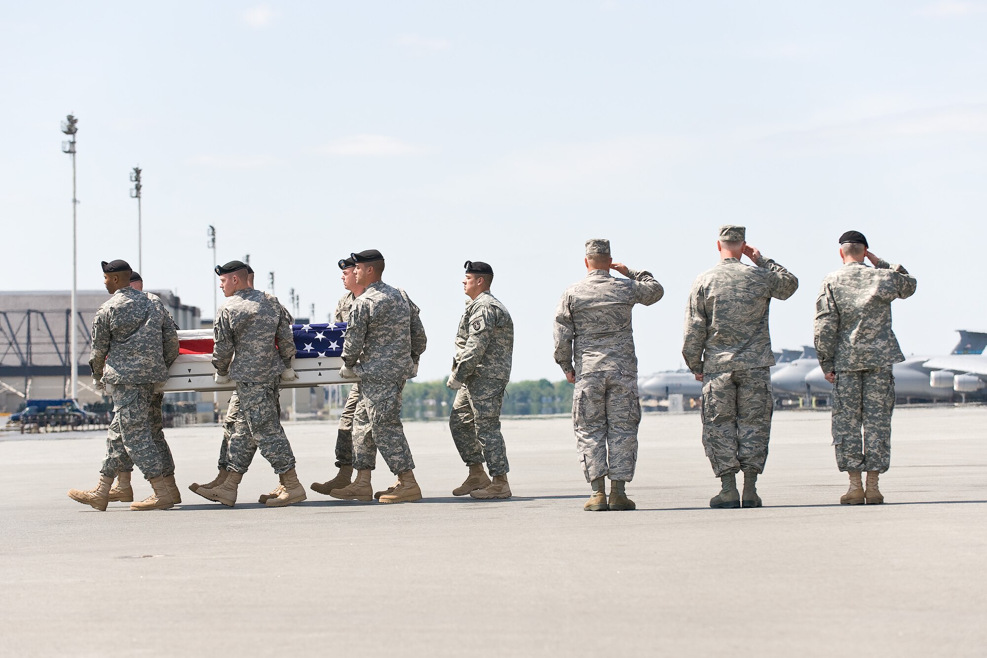 A U.S. Army carry team transfers the remains of Army Sgt. Matthew D. Hermanson, of Appleton, Wis., at Dover Air Force Base, Del., April 30, 2011. Hermanson was assigned to the 2nd Battalion, 4th Infantry Regiment, 4th Brigade Combat Team, 10th Mountain Division, Fort Polk, La. (U.S. Air Force photo/Roland Balik)