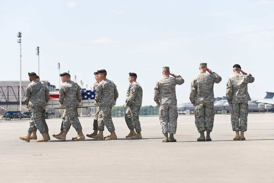 A U.S. Army carry team transfers the remains of Army Sgt. Matthew D. Hermanson, of Appleton, Wis., at Dover Air Force Base, Del., April 30, 2011. Hermanson was assigned to the 2nd Battalion, 4th Infantry Regiment, 4th Brigade Combat Team, 10th Mountain Division, Fort Polk, La. (U.S. Air Force photo/Roland Balik)
