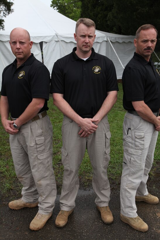 Three members of the U.S. Marine Corps Reserve Shooting Team, Gunnery Sgt. William Kevin Walker, Chief Warrant Officer 3 Stephen G. Ryther and 1st Sgt. Clark Rhiel, attend the Blue Ridge Mountain 3-Gun Championship in Park City, Ky., May 1, 2011.