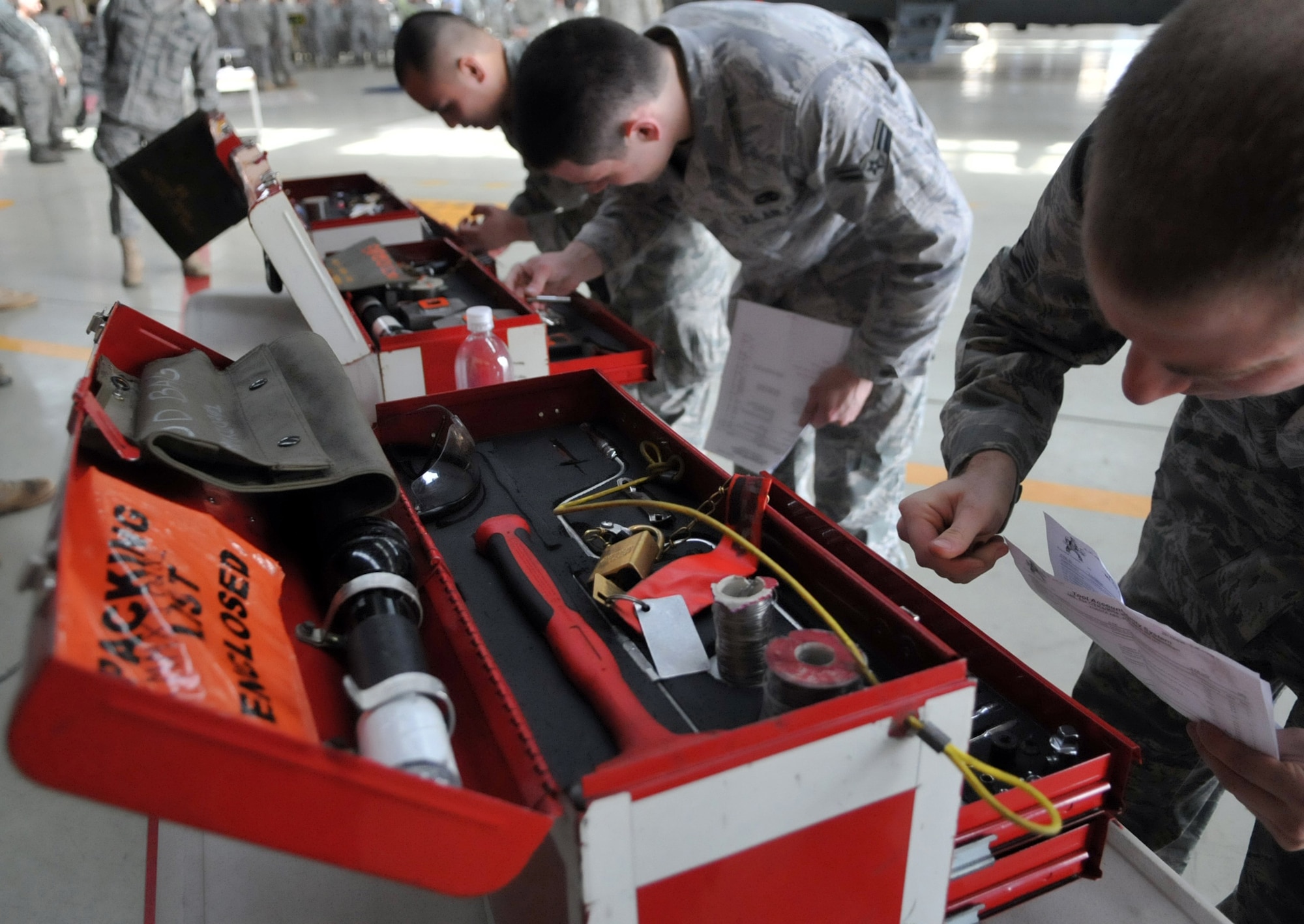 YOKOTA AIR BASE, Japan -- 374th Maintenance Group Airmen perform a master inventory list accountability check during the Annual Wrench Benders Competition at Yokota Air Base, Japan, May 2, 2011. This event tests Airmen's ability to ensure that all tools are accounted for before and after Consolidated Tool Kits are used. (U.S. Air Force photo/Airman 1st Class Krystal M. Garrett) 