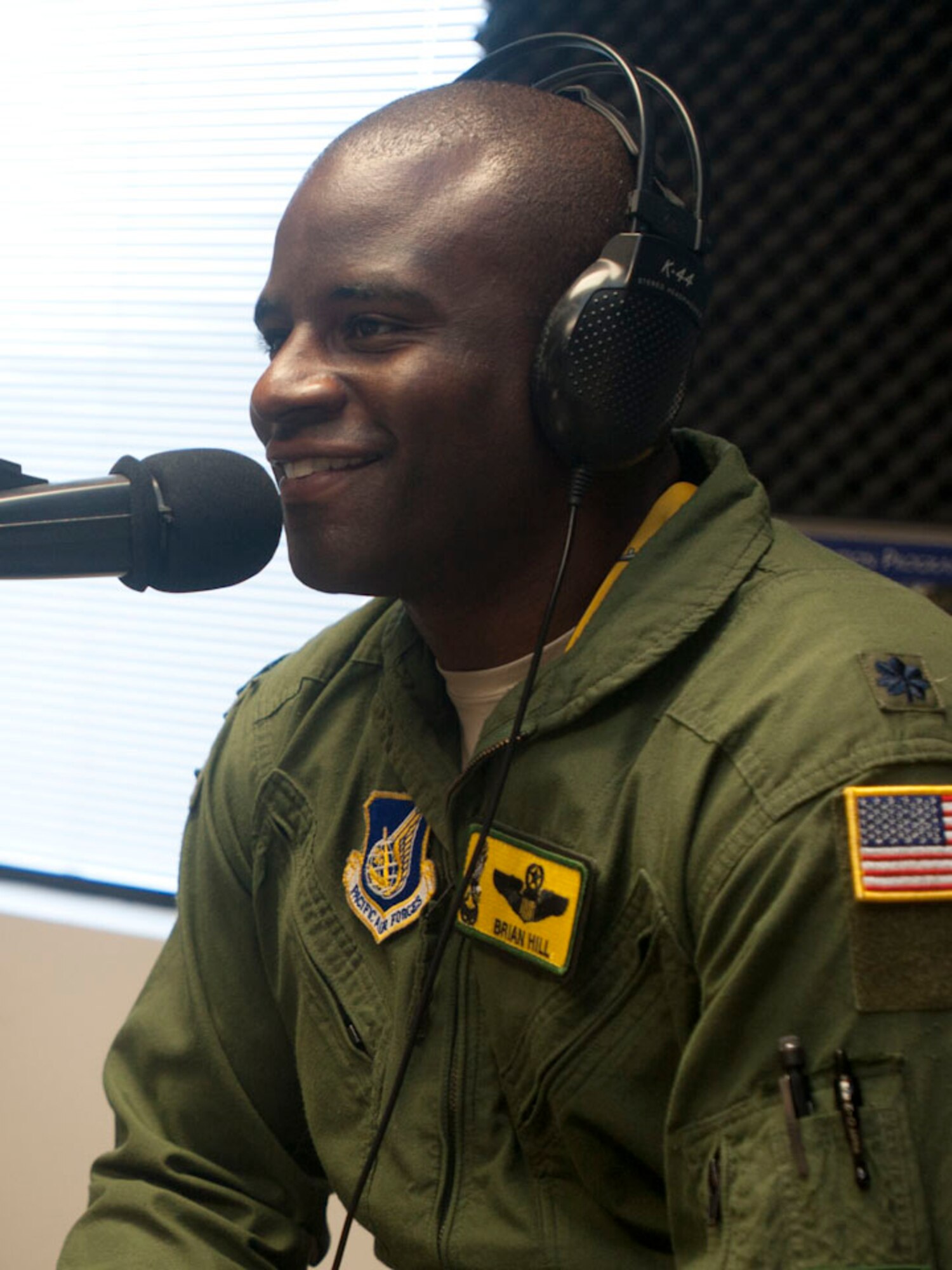 Lt. Col. Brian Hill, 96th Air Refueling Squadron commander, speaks to Rick Hamada, KHVH-AM 830 radio personality, for Military Appreciation Month May 2, 2011. Colonel Hill's interview kicked off one of many Air Force interviews that will be conducted this month to highlight military members through out the month of May. Colonel Hill spoke about his career, why he joined, the Airmen he works with and family. (U.S. Air Force photo/Airman 1st Class Lauren Main)