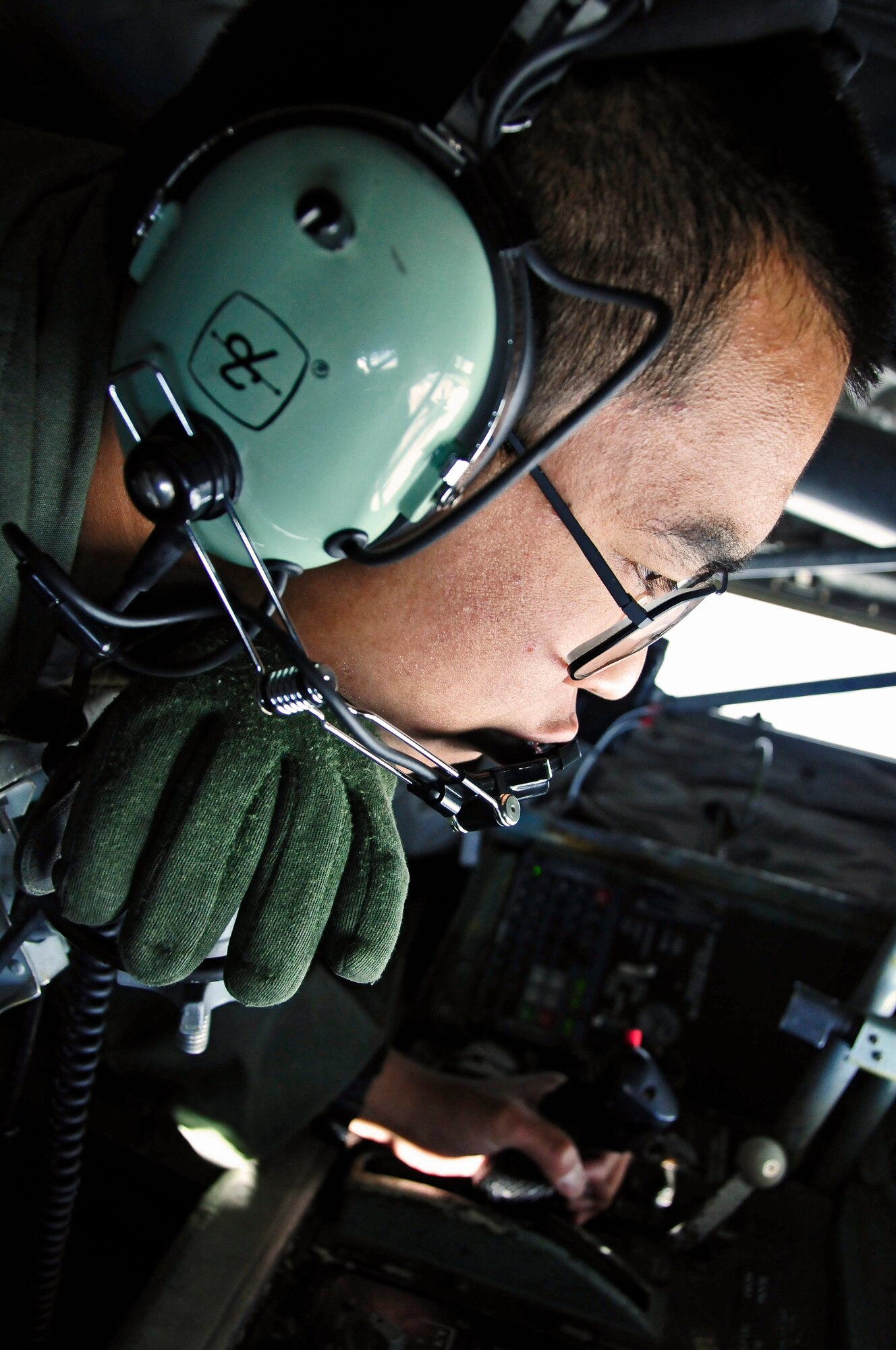 Airman 1st Class Tazmin Urata refuels an F-16 Fighting Falcon over the Joint Pacific Alaska Range Complex during RED FLAG-Alaska 11-1, April 28, 2011. The JPARC covers more than 67,000 square miles and enables the military to have the largest air-ground training complex in America.  Airman Urata is a boom operator assigned to the 92nd Air Refueling Wing, Fairchild Air Force Base, Wash.  (U.S. Air Force photo/Staff Sgt. Miguel Lara III)