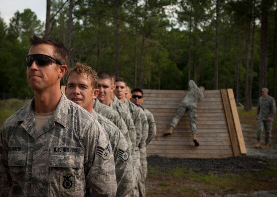 CAMP BLANDING, Fla.-- Senior Airman Charles Killbrew, 823rd Base Defense Squadron fireteam member, stands at the front of the line during participation in the obstacle course April 27. Before starting each station on the obstacle course, Airmen were required to stand in a single-file line with their backs to the obstacle. After completion, they had to come to attention and shout, “Air Assault.” (U.S. Air Force photo/Airman 1st Class Joshua Green)(RELEASED)
