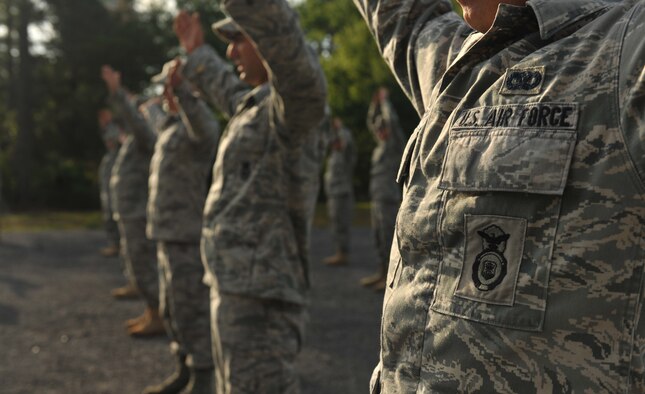 CAMP BLANDING, Fla.-- Members of the 820th Base Defense Group out of Moody Air Force Base, Ga., participate in physical training April 27. The Airmen visited Camp Blanding to utilize their obstacle course and prepare for the Army Air Assault School. (U.S. Air Force photo/Airman 1st Class Joshua Green)(RELEASED)
