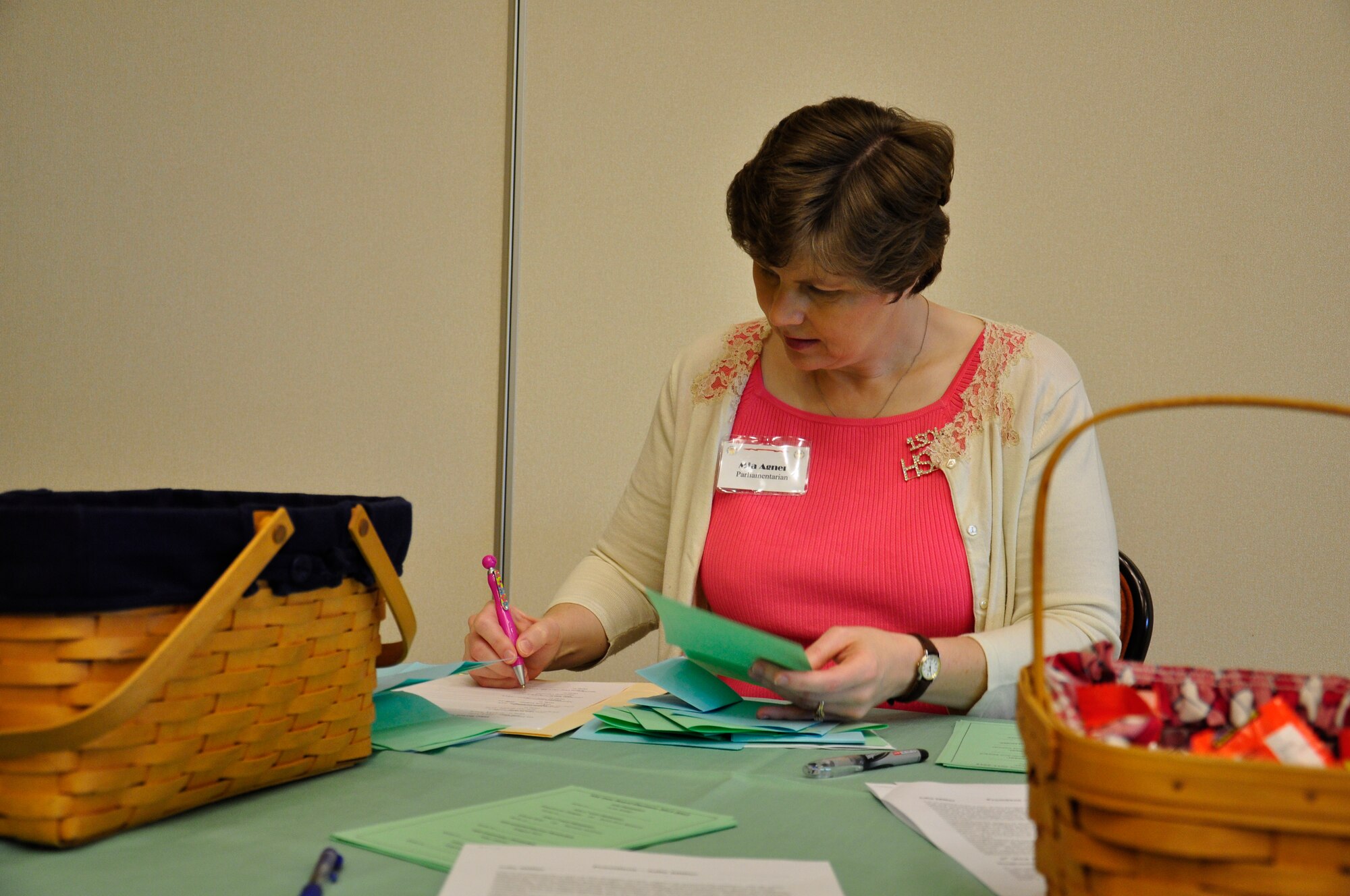 Mrs. Mia Agner, Hurlburt Field Spouses' Club member, counts votes for the 2011 HSC officer elections at the Soundside Club Hurlburt Field, Fla., April 14, 2011. The HSC hosts a monthly luncheon and all Hurlburt Field spouses are invited. (DOD photo by Air Force Staff Sgt. Sarah Martinez/RELEASED)