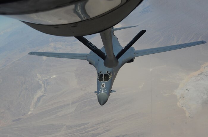 NELLIS AIR FORCE BASE, Nev. --  A B-1B Lancer from the 34th Bomb Squadron, Ellsworth AFB, S.D., moves into position April 28, to refuel from a KC-135 Stratotanker assigned to 190 Air Refueling Wing, Forbes Field, Kan. during Green Flag West 11-6.  Green Flag West provides a realistic close-air support training environment for Airmen and Soldiers preparing to deploy in support of combat operations. (U.S. Air Force photo by Master Sgt. Kevin J. Gruenwald)