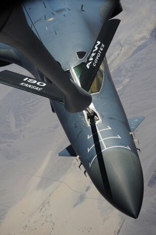 NELLIS AIR FORCE BASE, Nev. -- A  B-1B Lancer from the 34th Bomb Squadron, Ellsworth AFB, S.D., moves into position  April 28, to refuel from a KC-135 Stratotanker assigned to 190 Air Refueling Wing, Forbes Field, Kan. during Green Flag West 11-6.  Green Flag West provides a realistic close-air support training environment for Airmen and Soldiers preparing to deploy in support of combat operations. (U.S. Air Force photo by Master Sgt. Kevin J. Gruenwald)