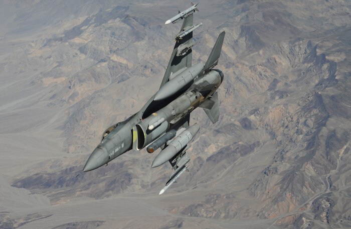 NELLIS AIR FORCE BASE, Nev. --  An F-16 Fighting Falcon from the 79th Fighter Squadron, Shaw Air Force Base, S.C., heads out to the fight April 28, during Green Flag West 11-6. Green Flag West provides a realistic close-air support training environment for Airmen and Soldiers preparing to deploy in support of combat operations. (U.S. Air Force photo by Master Sgt. Kevin J. Gruenwald)