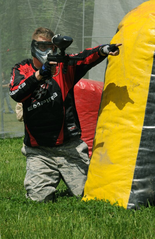 Staff Sgt. Brandon Jewell, 11 Civil Engineer Squadron engineering apprentice, points downrange during a free game of paintball at the Andrews paintball field April 29.  The field held an open house with free games and food in effort to attract more players this season. (U.S. Air Force Photo by Senior Airman Torey Griffith)(released)