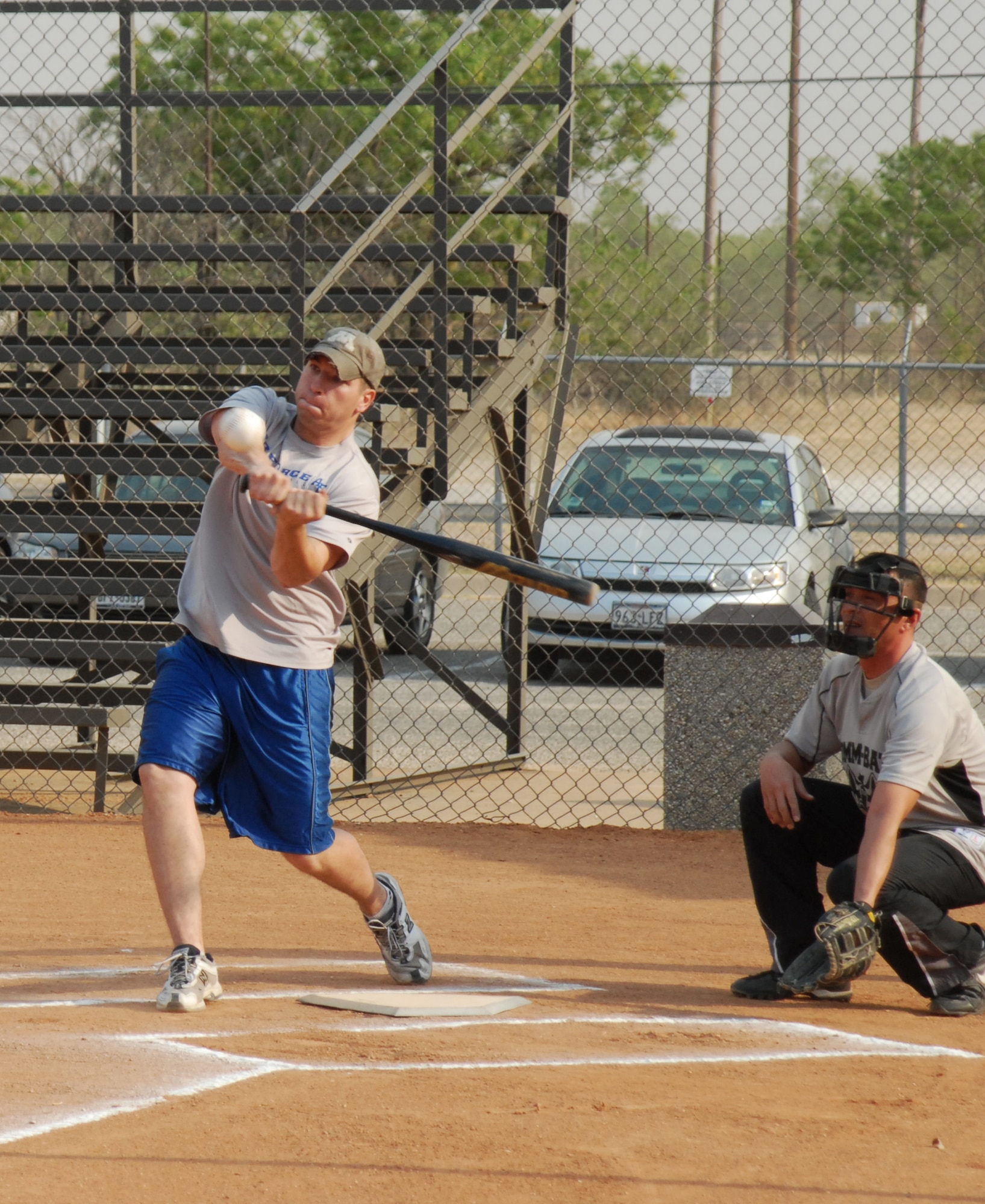 GOODFELLOW AIR FORCE BASE,Texas -- William Katz, 315th Training Squadron, hits one into far left field during an intramural softball game against 17th Communications Squadron April 26. The 315tg TRS beat the 17th CS 24-8. (U.S. Air Force photo/Airman 1st Class Michael Smith)